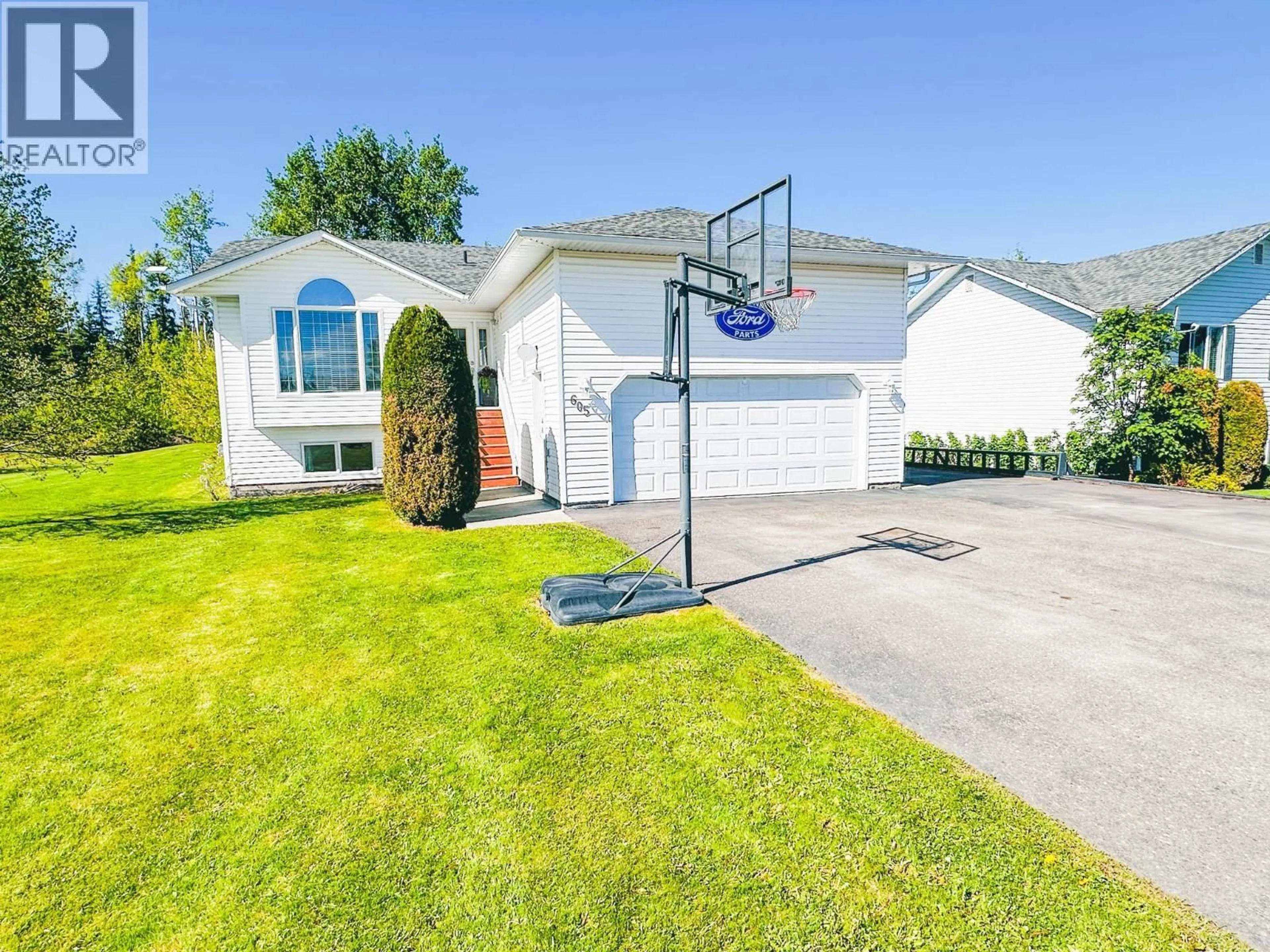 Home with vinyl exterior material, street for 605 9TH AVENUE, Burns Lake British Columbia V0J1E0