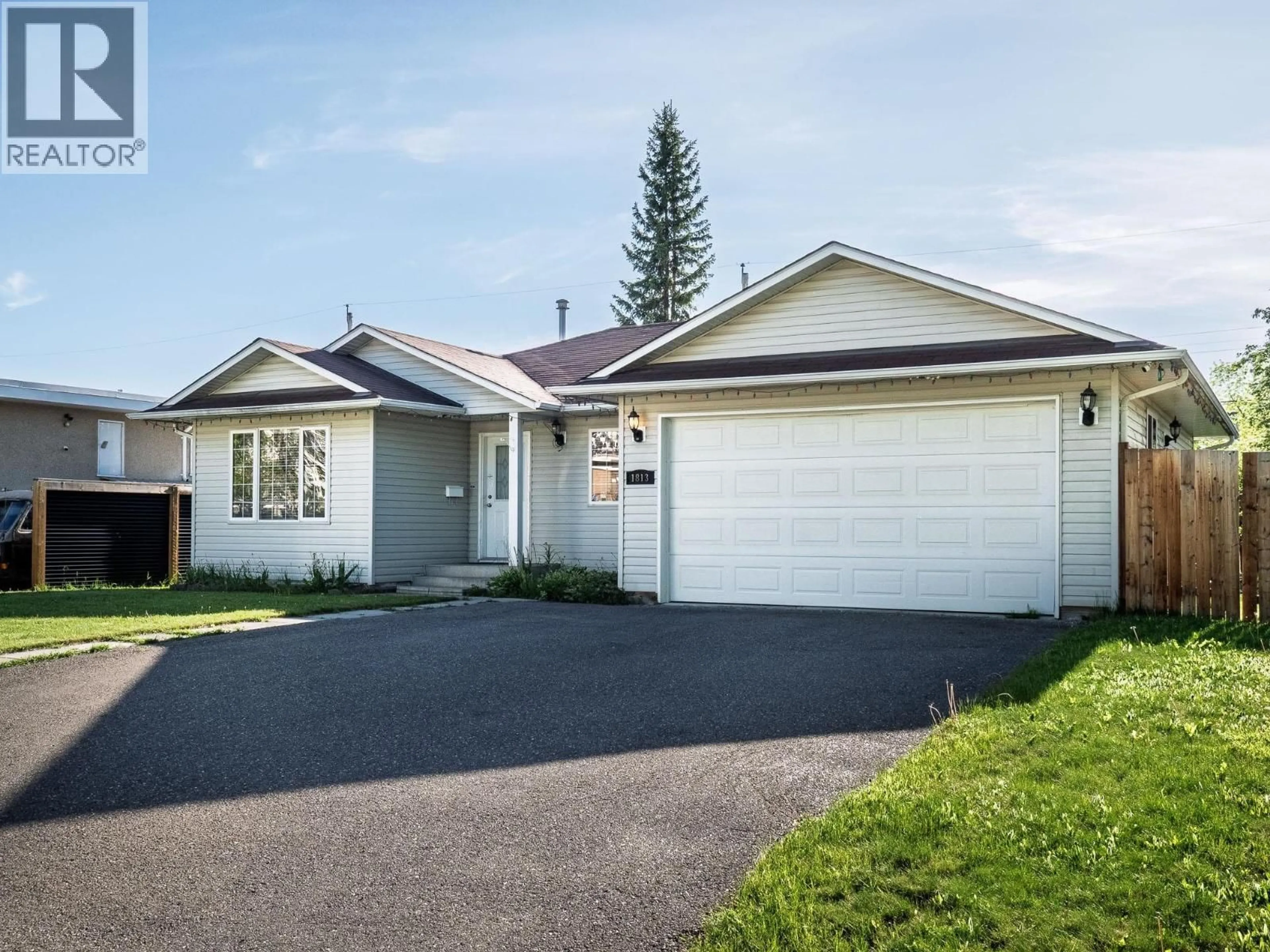 Home with vinyl exterior material, street for 1813 GORSE STREET, Prince George British Columbia V2L1G7