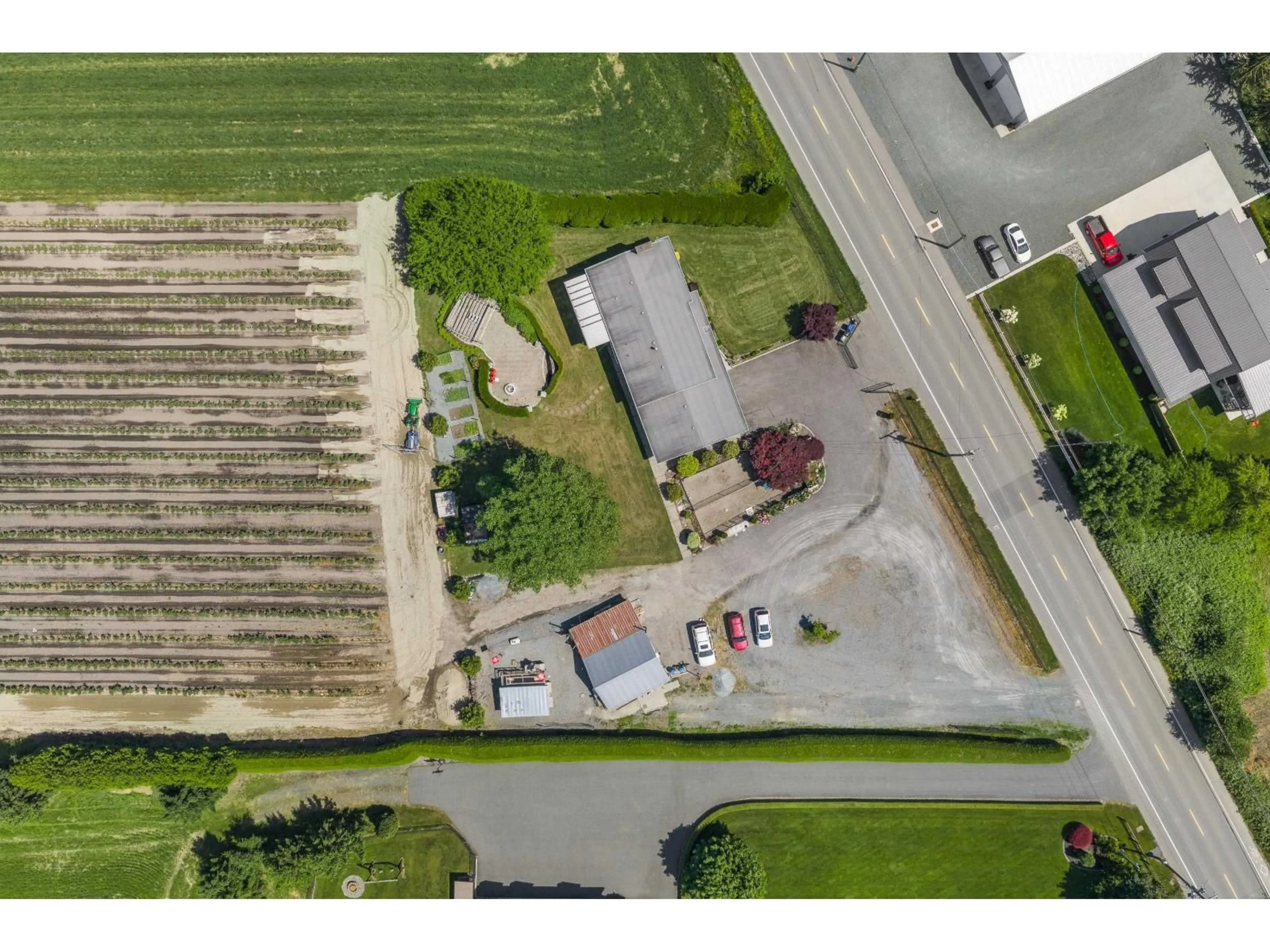 A pic from outside/outdoor area/front of a property/back of a property/a pic from drone, street for 42505 YALE ROAD, Sardis - Greendale British Columbia V2R4J4