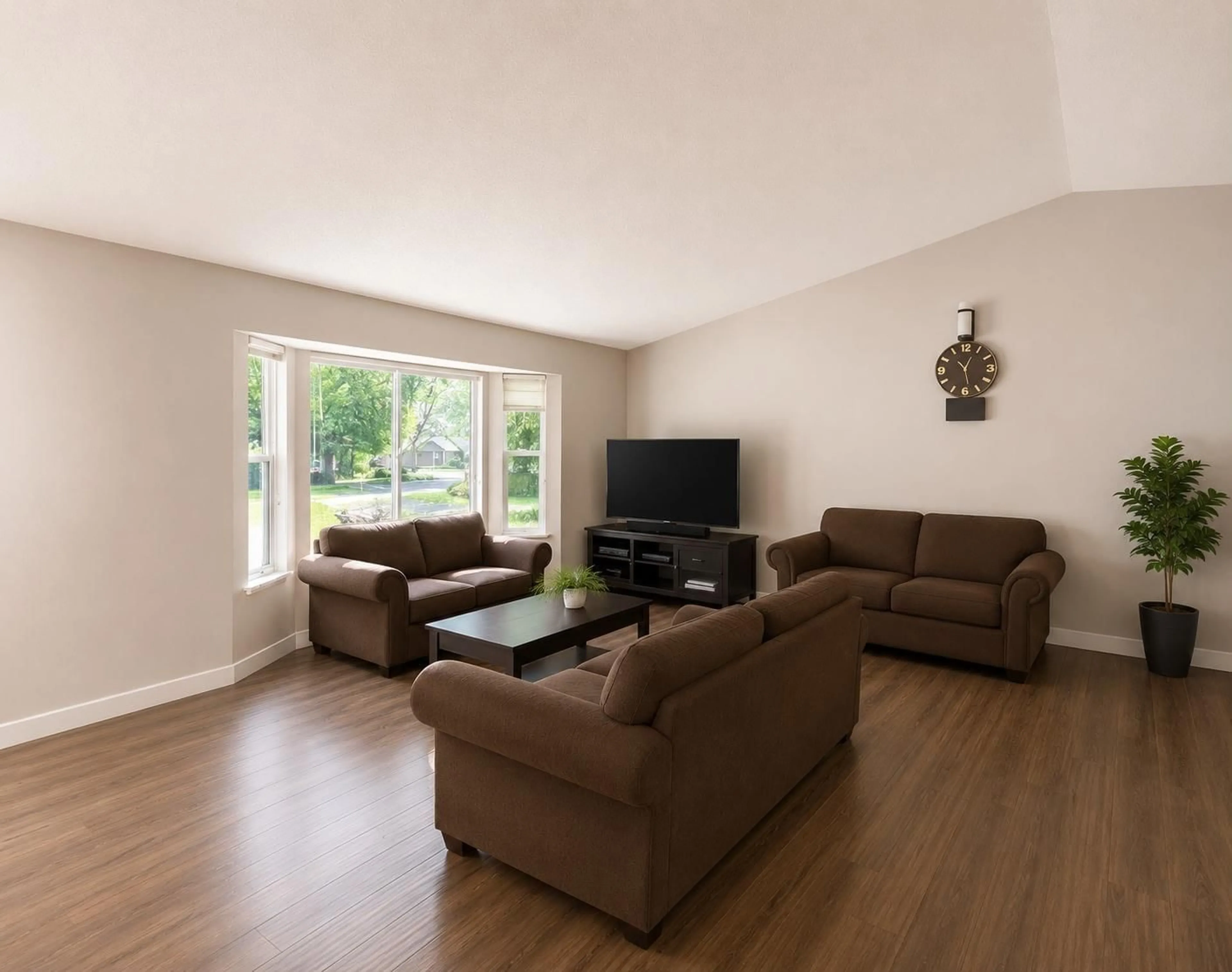 Living room with furniture, wood/laminate floor for 14565 91A AVENUE, Surrey British Columbia V3R7K6