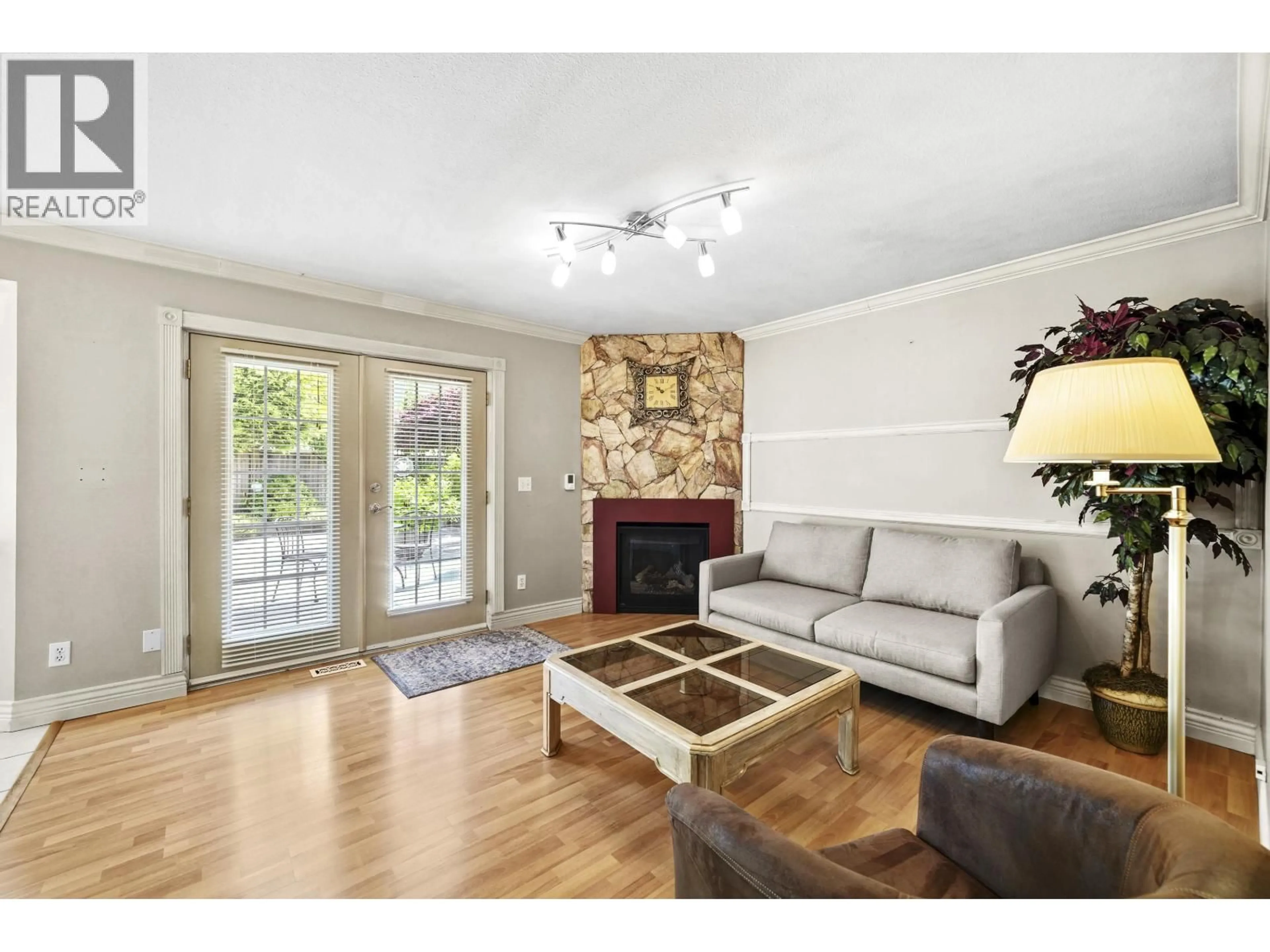 Living room with furniture, wood/laminate floor for 3731 BRACEWELL COURT, Port Coquitlam British Columbia V3B7B6