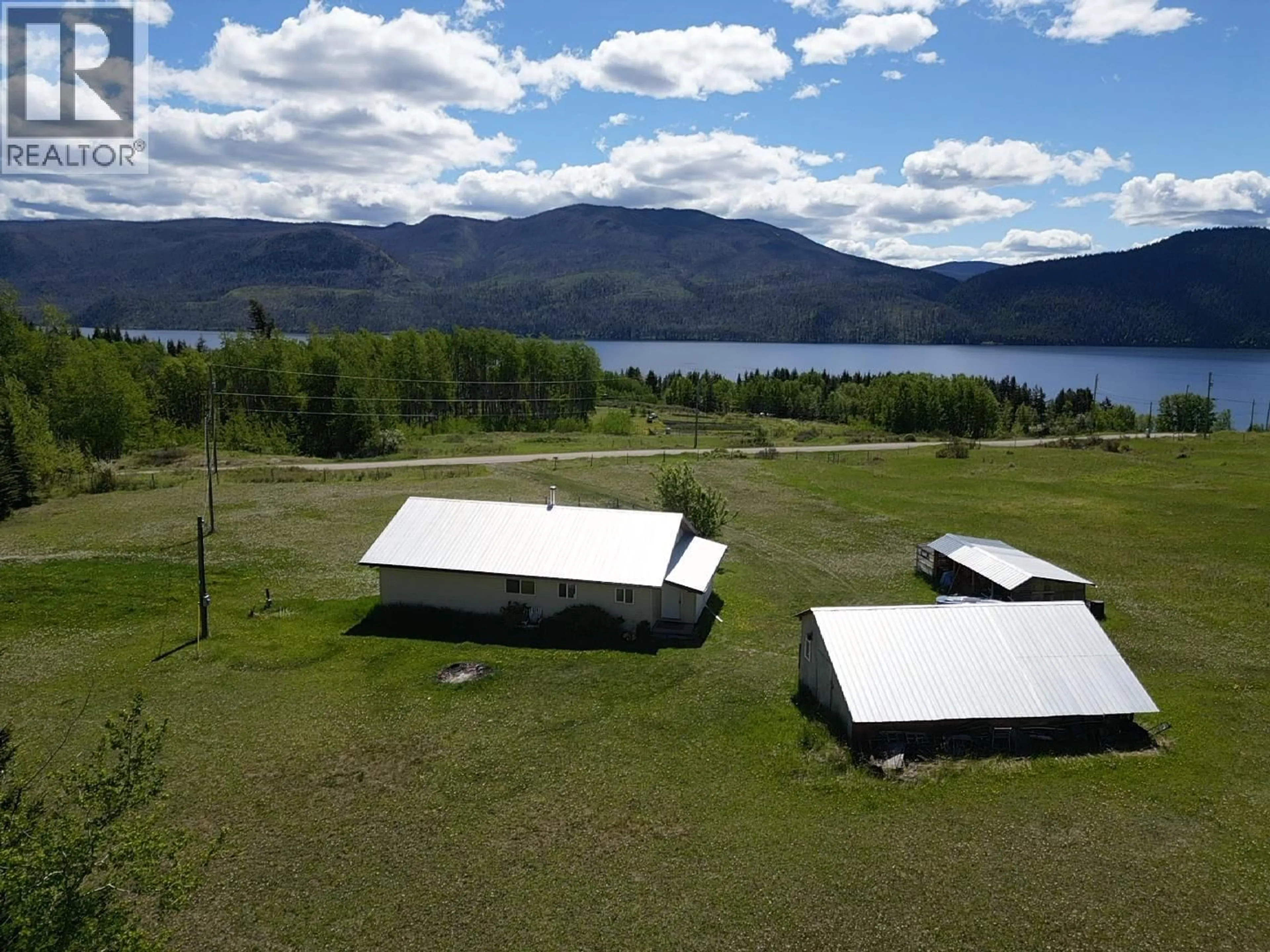 A pic from outside/outdoor area/front of a property/back of a property/a pic from drone, water/lake/river/ocean view for 3150 FRANCOIS LAKE ROAD, Fraser Lake British Columbia V0J1S0