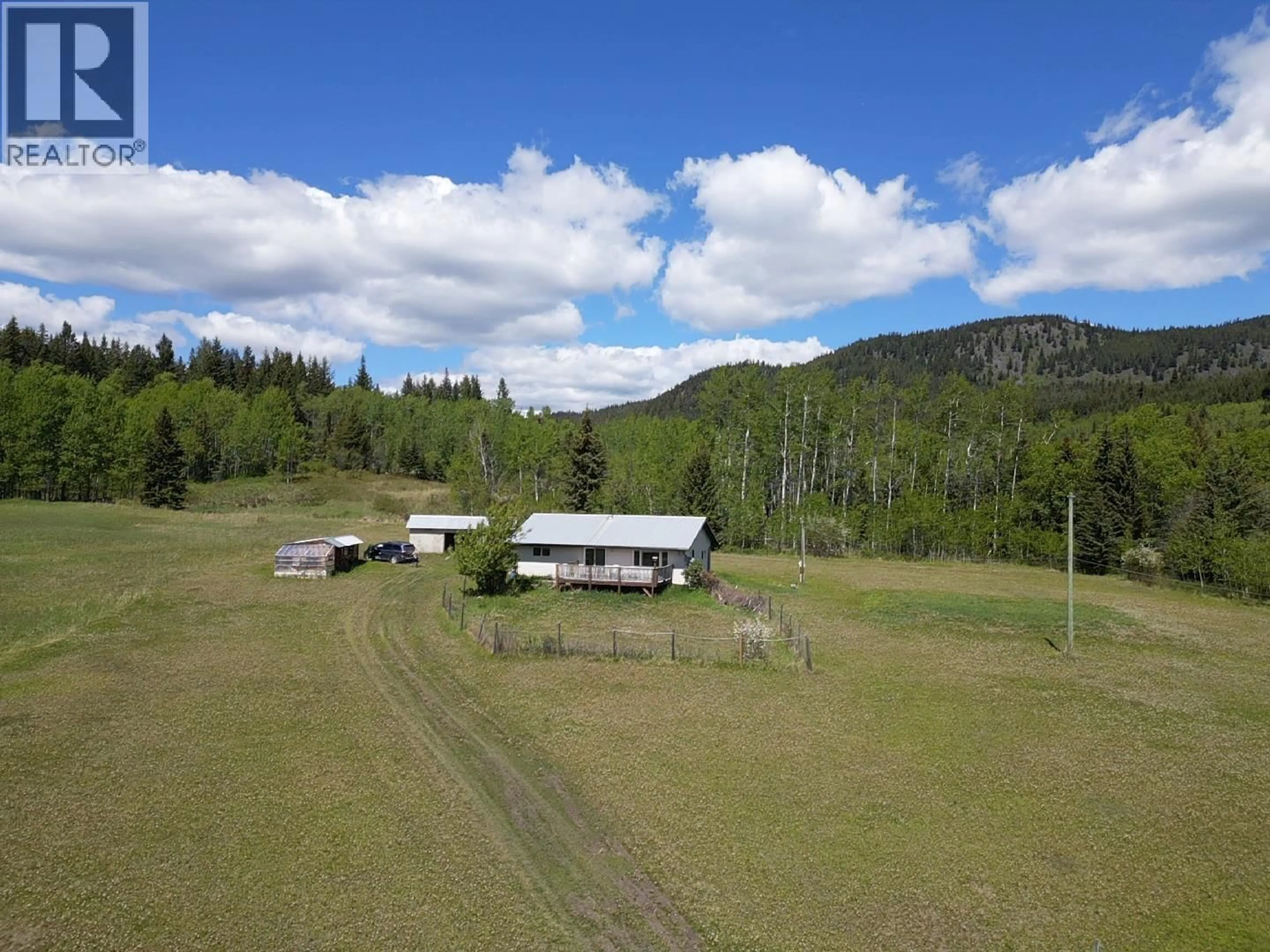 A pic from outside/outdoor area/front of a property/back of a property/a pic from drone, mountain view for 3150 FRANCOIS LAKE ROAD, Fraser Lake British Columbia V0J1S0