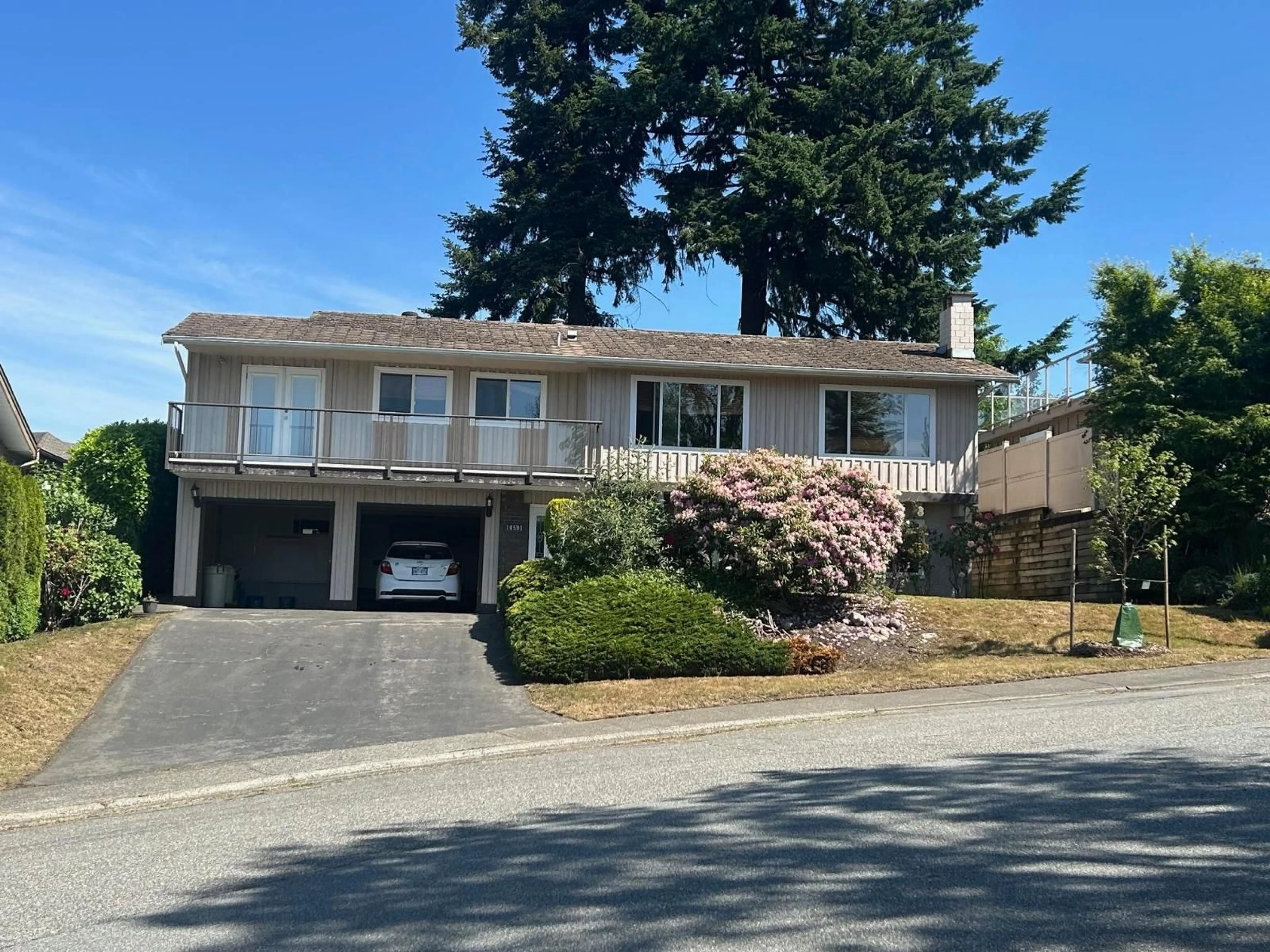 Home with vinyl exterior material, street for 10591 HERMOSA DRIVE, Delta British Columbia V4C6S8