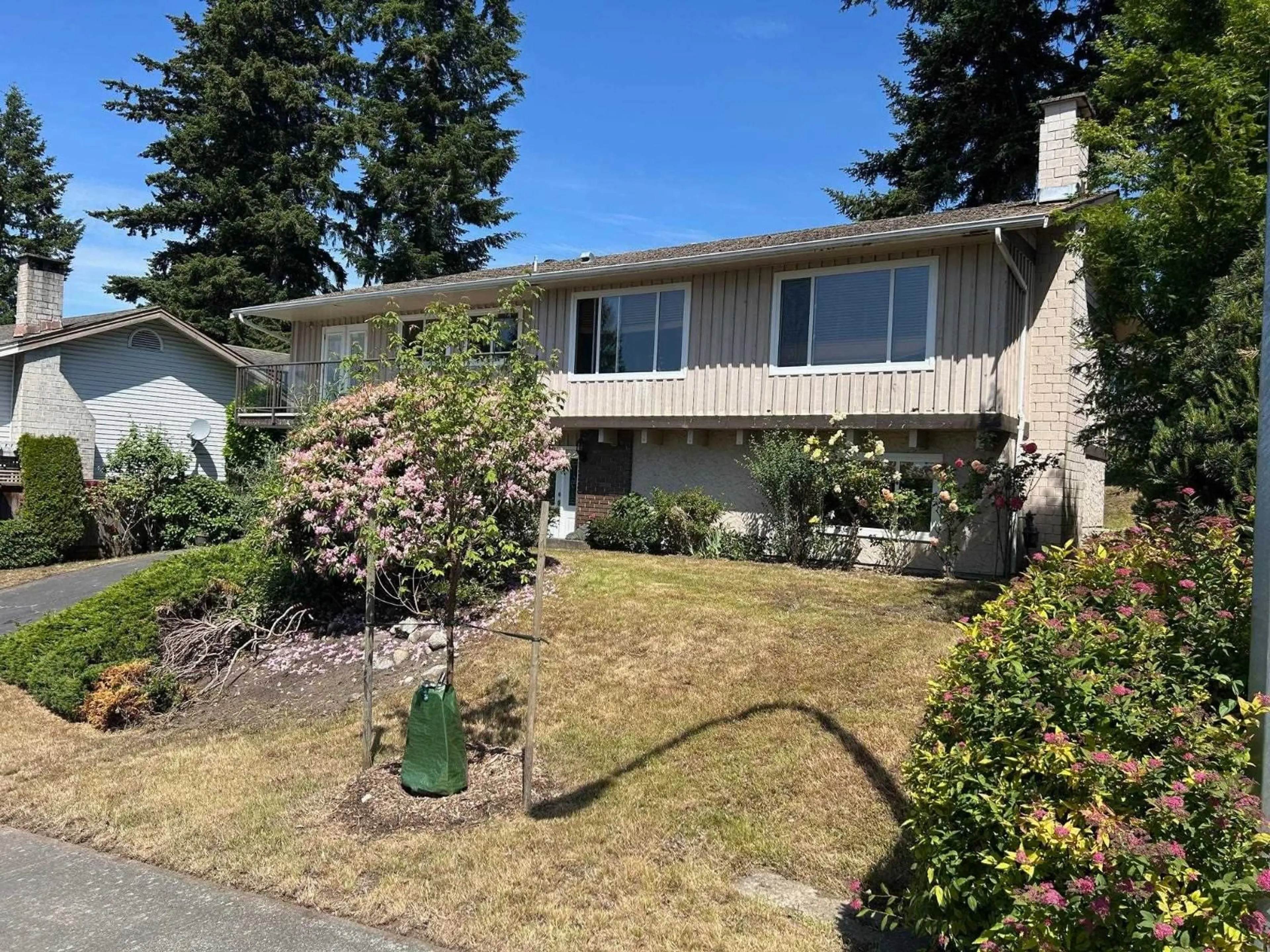 Home with vinyl exterior material, street for 10591 HERMOSA DRIVE, Delta British Columbia V4C6S8