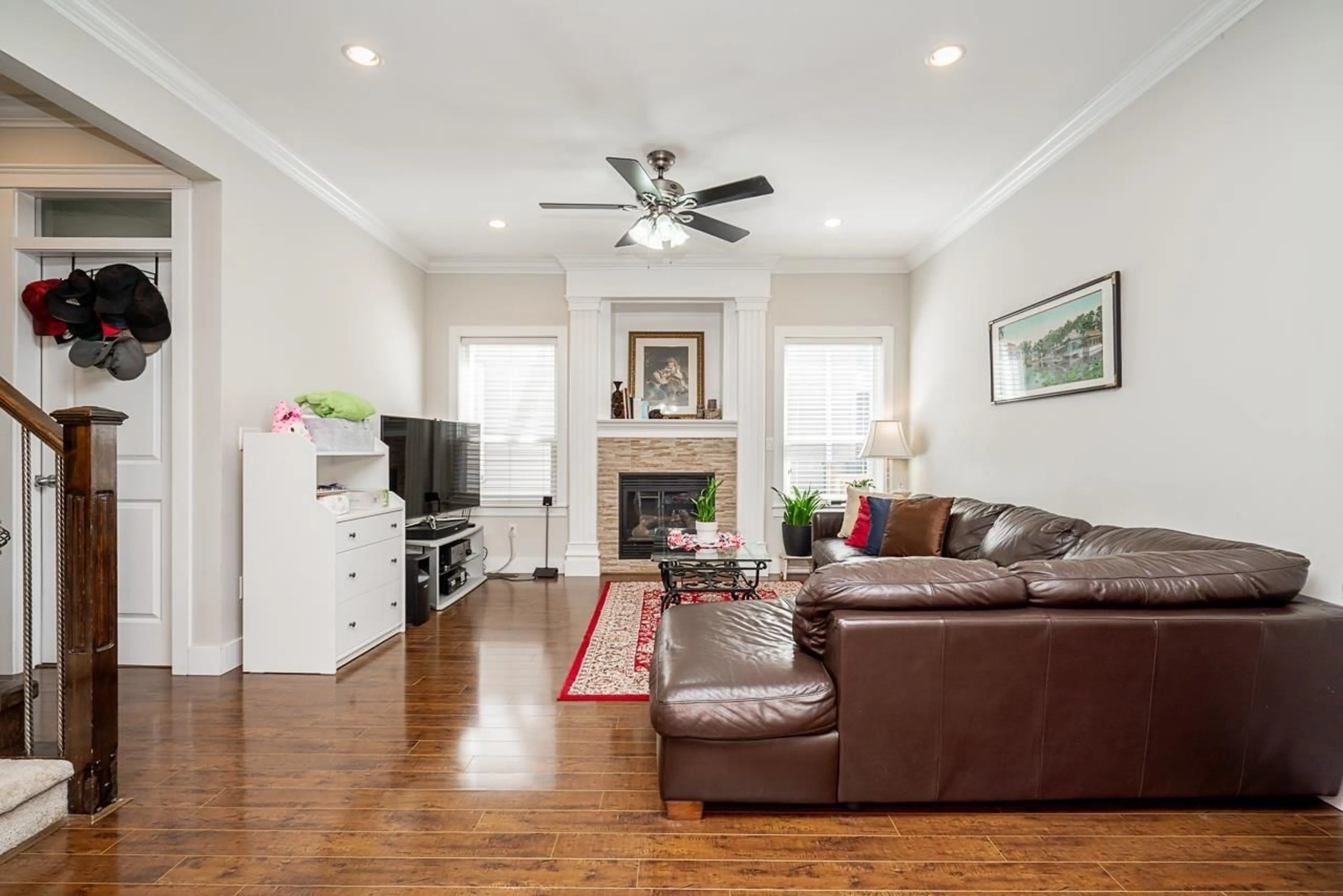 Living room with furniture, wood/laminate floor for 19338 72A AVENUE, Surrey British Columbia V4N5X9