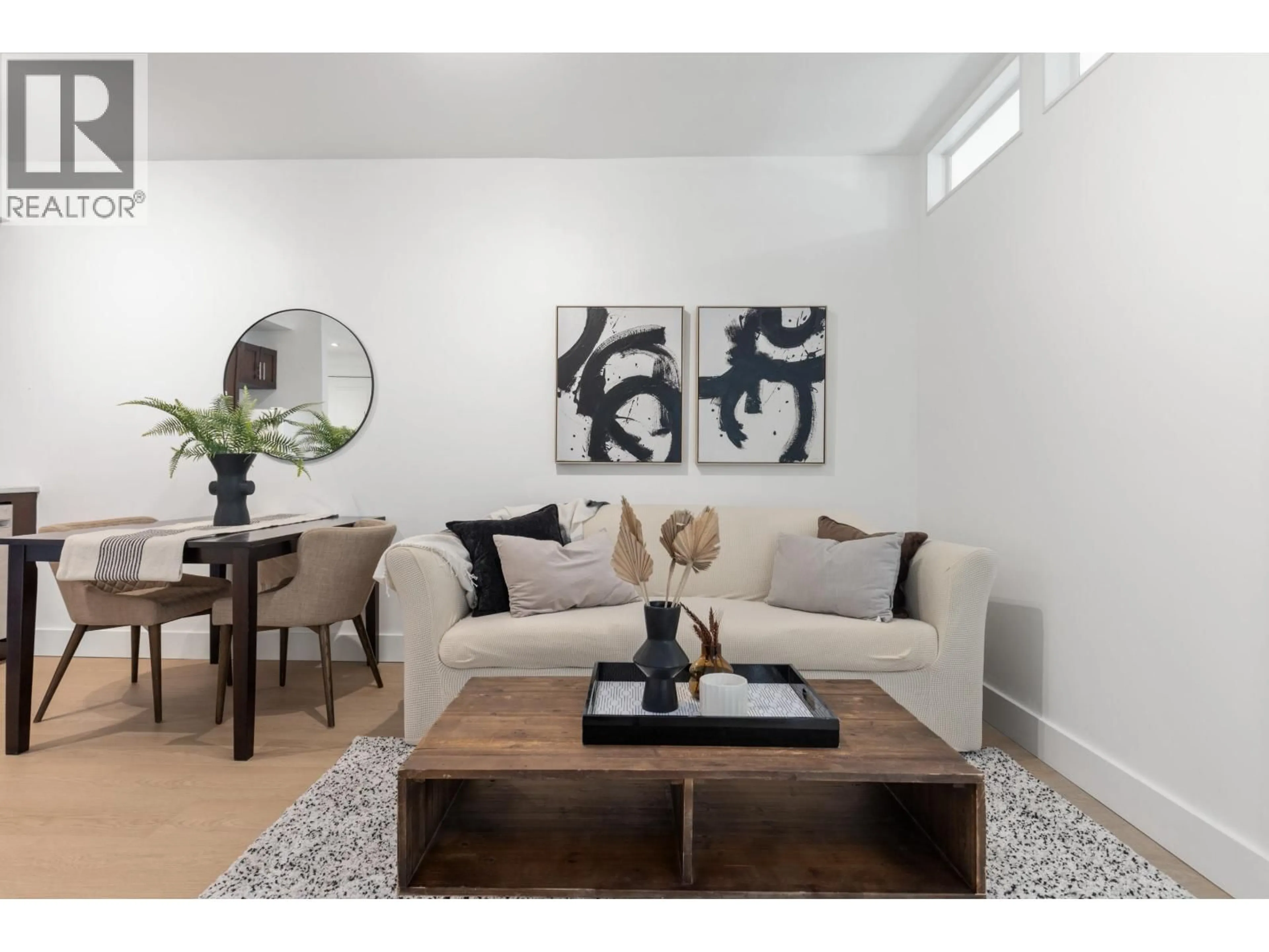 Living room with furniture, wood/laminate floor for 302 - 7330 ARBUTUS STREET, Pemberton British Columbia V0N2L1
