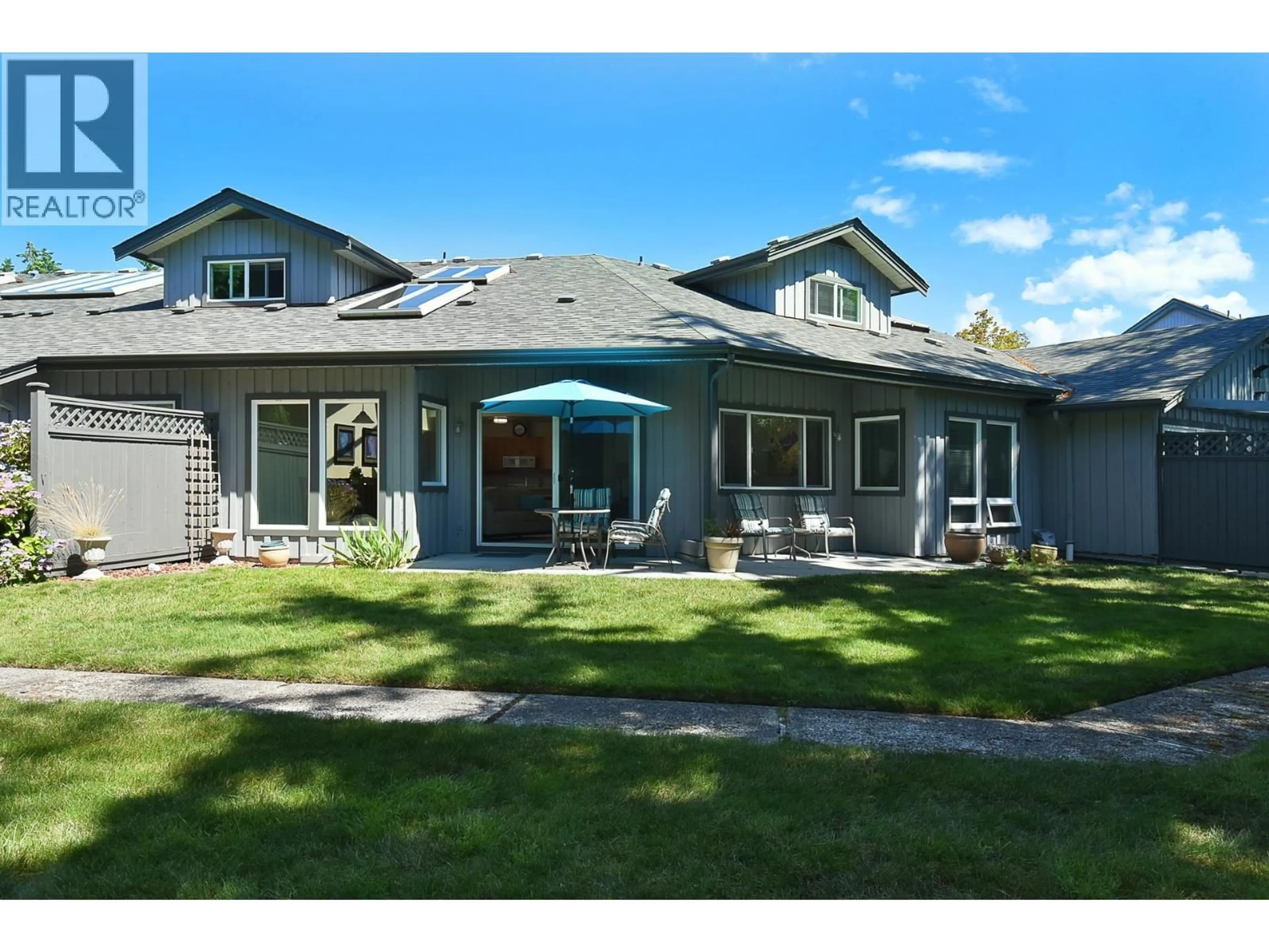 Home with vinyl exterior material, street for 11 - 5761 WHARF AVENUE, Sechelt British Columbia V0N3A0