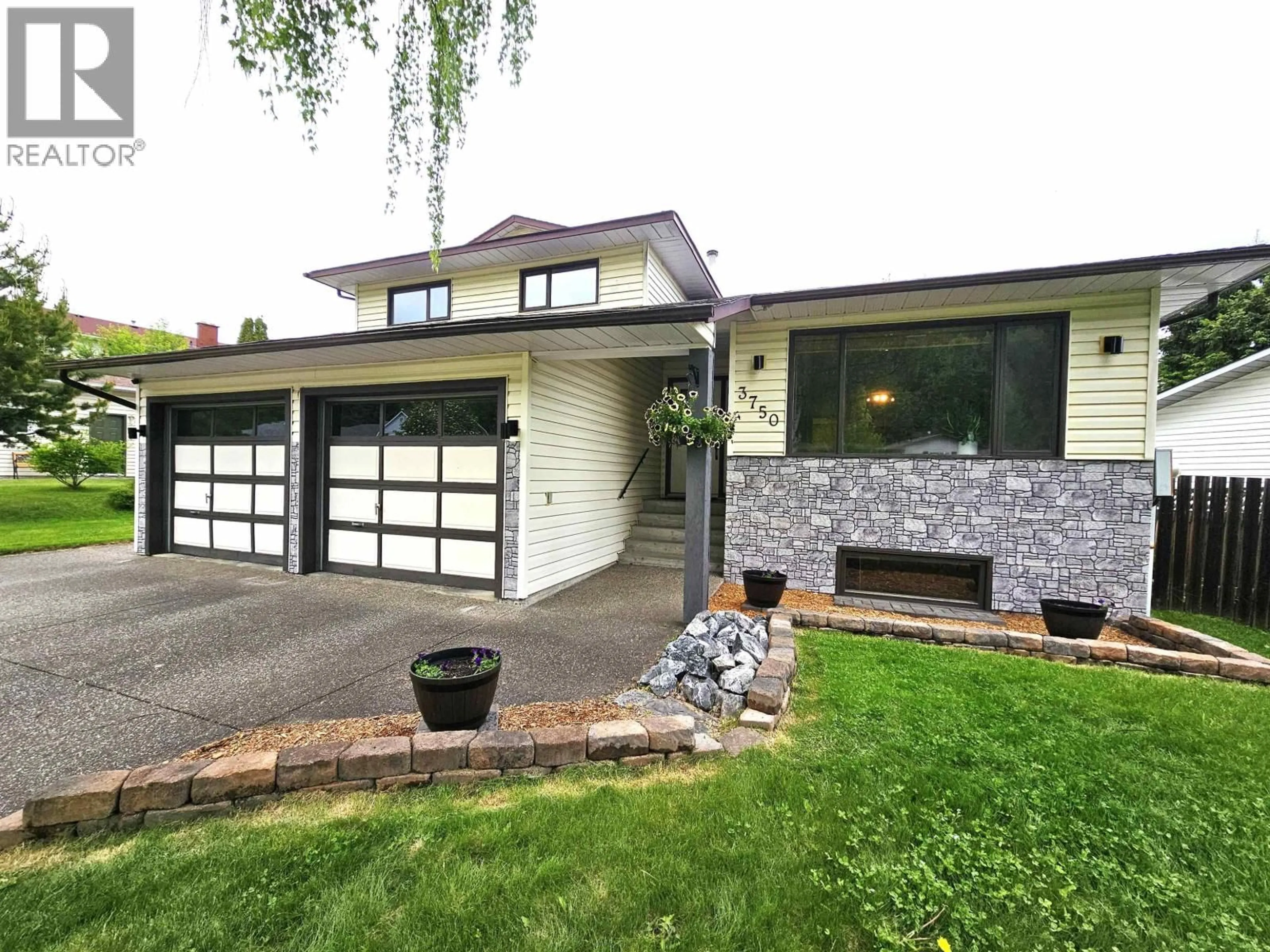 Home with brick exterior material, street for 3750 JAMES DRIVE, Prince George British Columbia V2N4V1