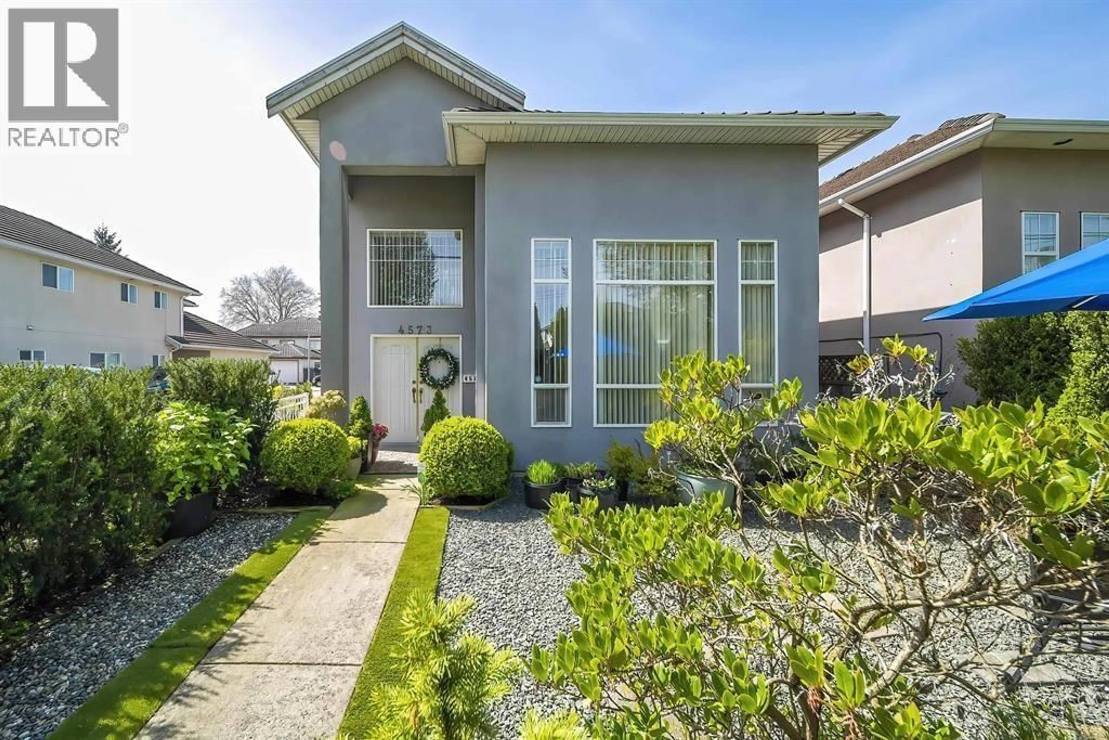 Home with vinyl exterior material, street for 4573 NO. 5 ROAD, Richmond British Columbia V6X2V5