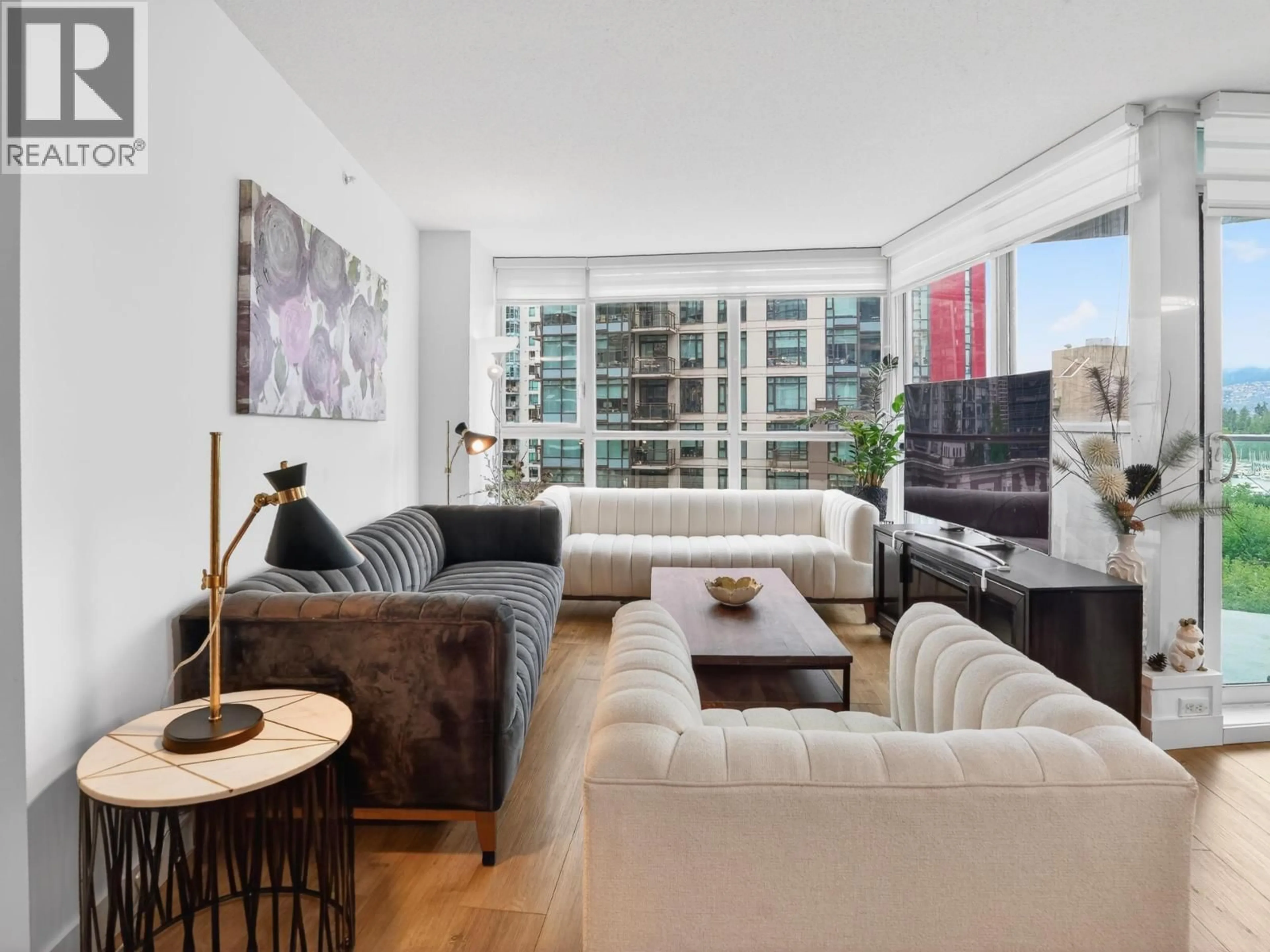 Living room with furniture, unknown for 801 - 1189 MELVILLE STREET, Vancouver British Columbia V6E4T8