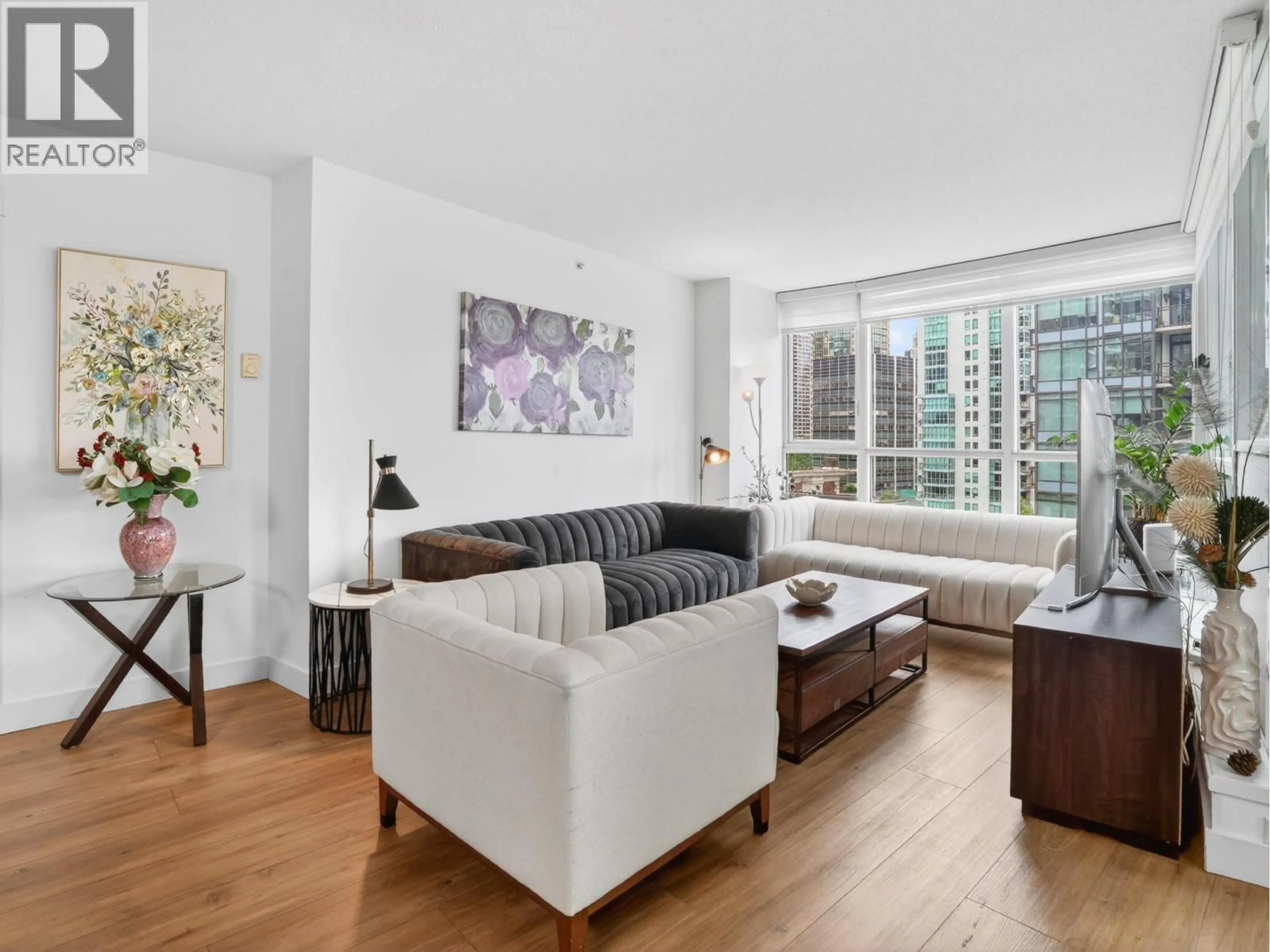 Living room with furniture, unknown for 801 - 1189 MELVILLE STREET, Vancouver British Columbia V6E4T8