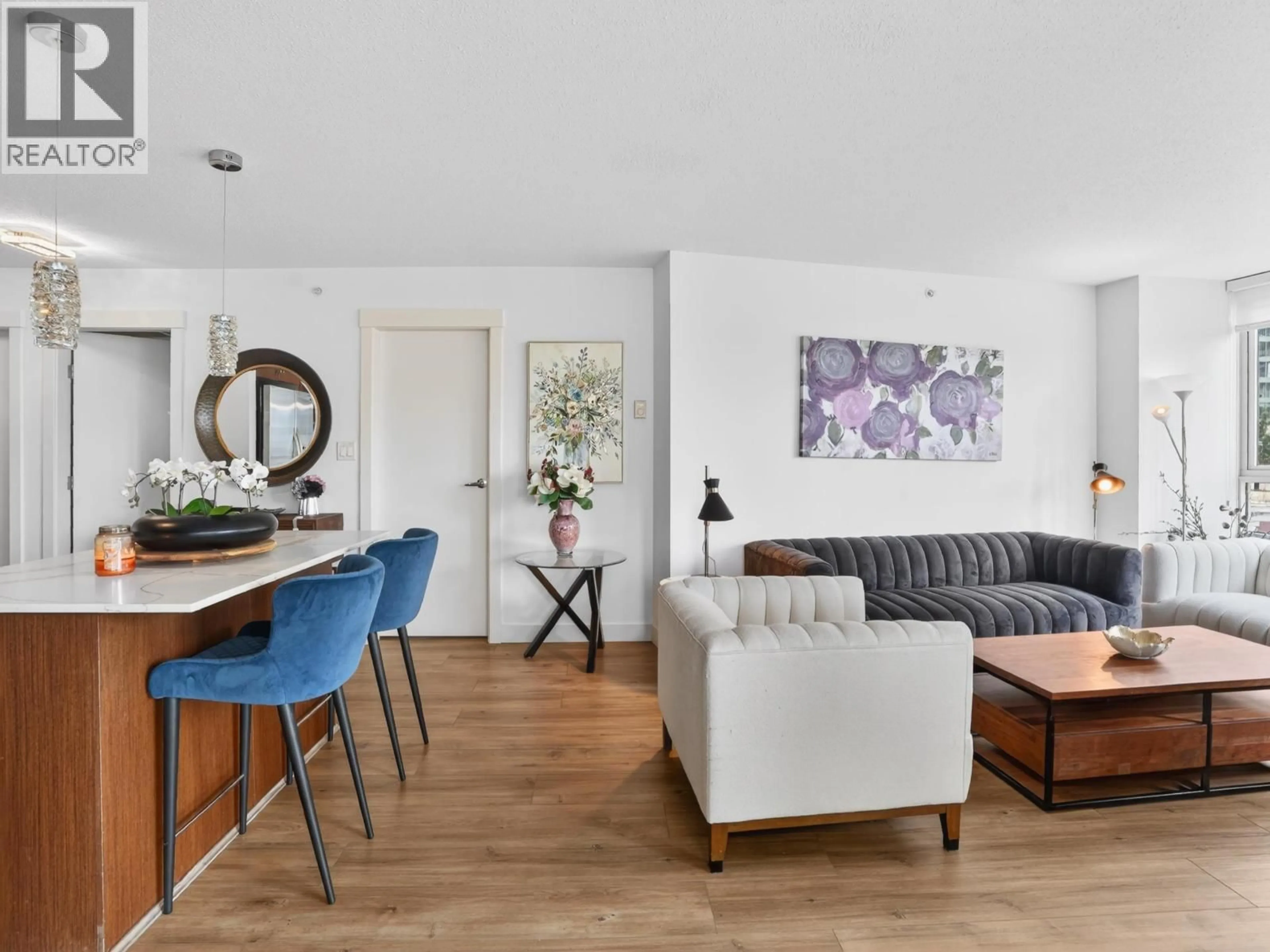 Living room with furniture, wood/laminate floor for 801 - 1189 MELVILLE STREET, Vancouver British Columbia V6E4T8