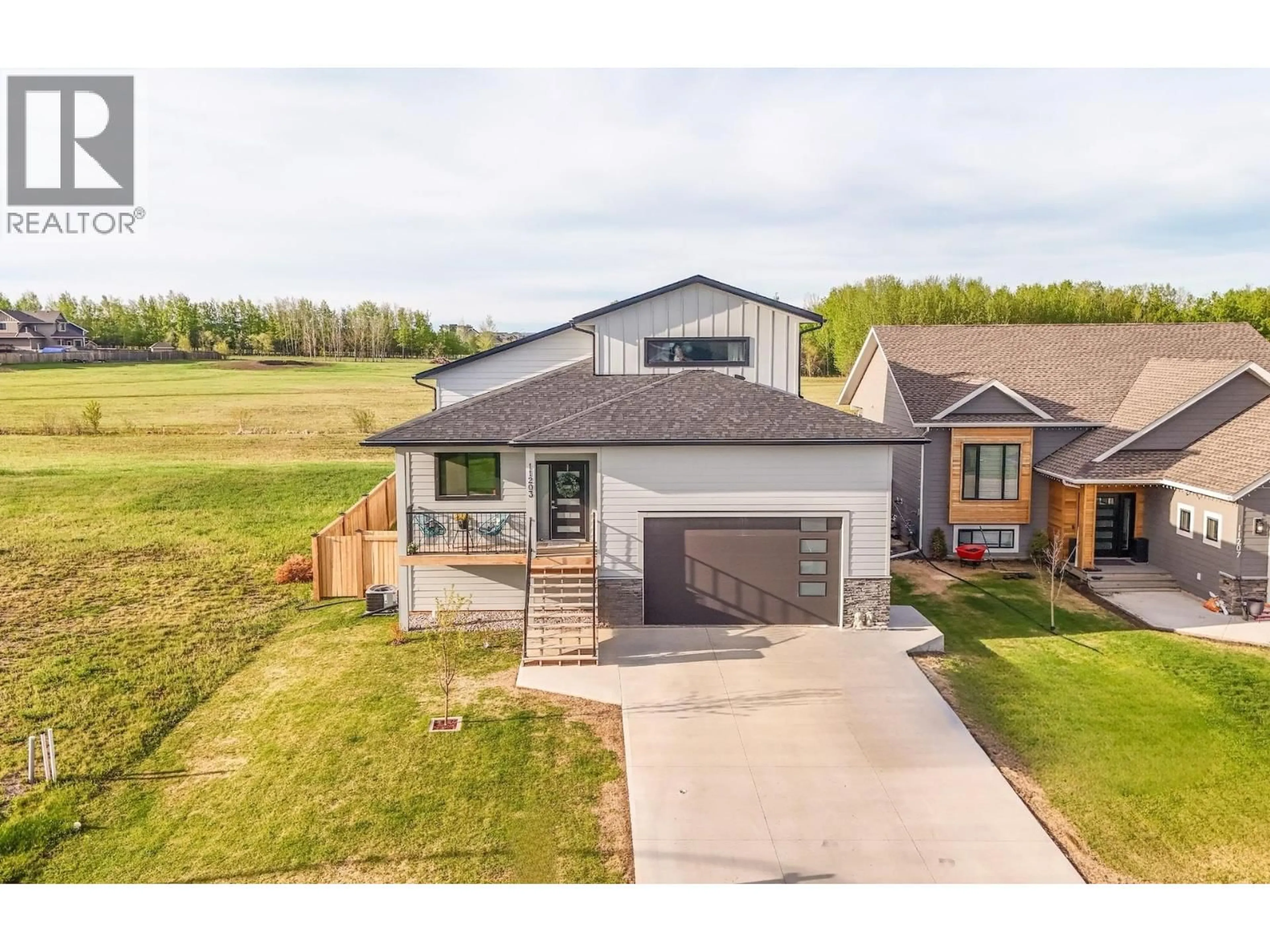 A pic from outside/outdoor area/front of a property/back of a property/a pic from drone, unknown for 11203 112 AVENUE, Fort St. John British Columbia V1J0R5