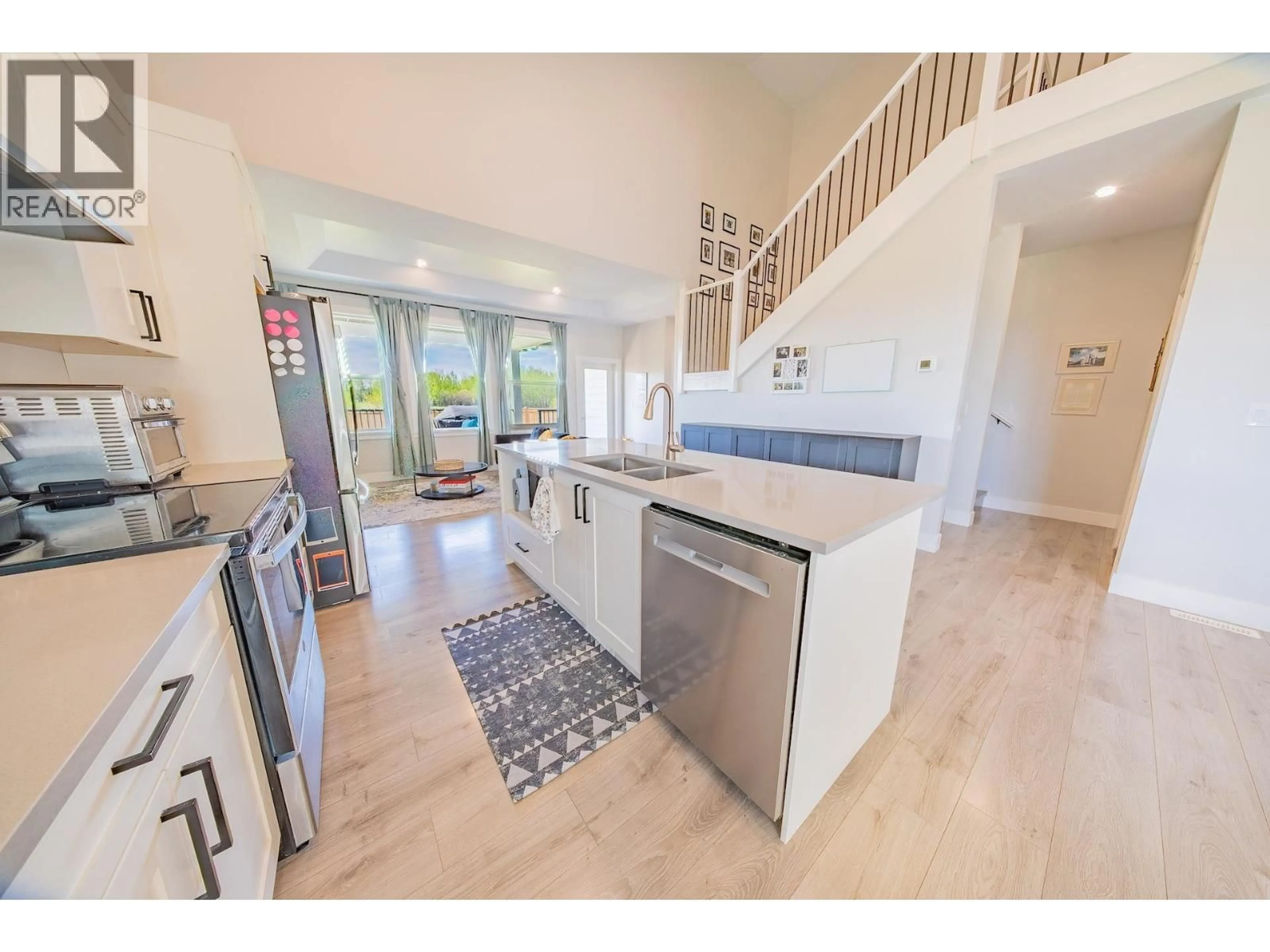 Open concept kitchen, ceramic/tile floor for 11203 112 AVENUE, Fort St. John British Columbia V1J0R5