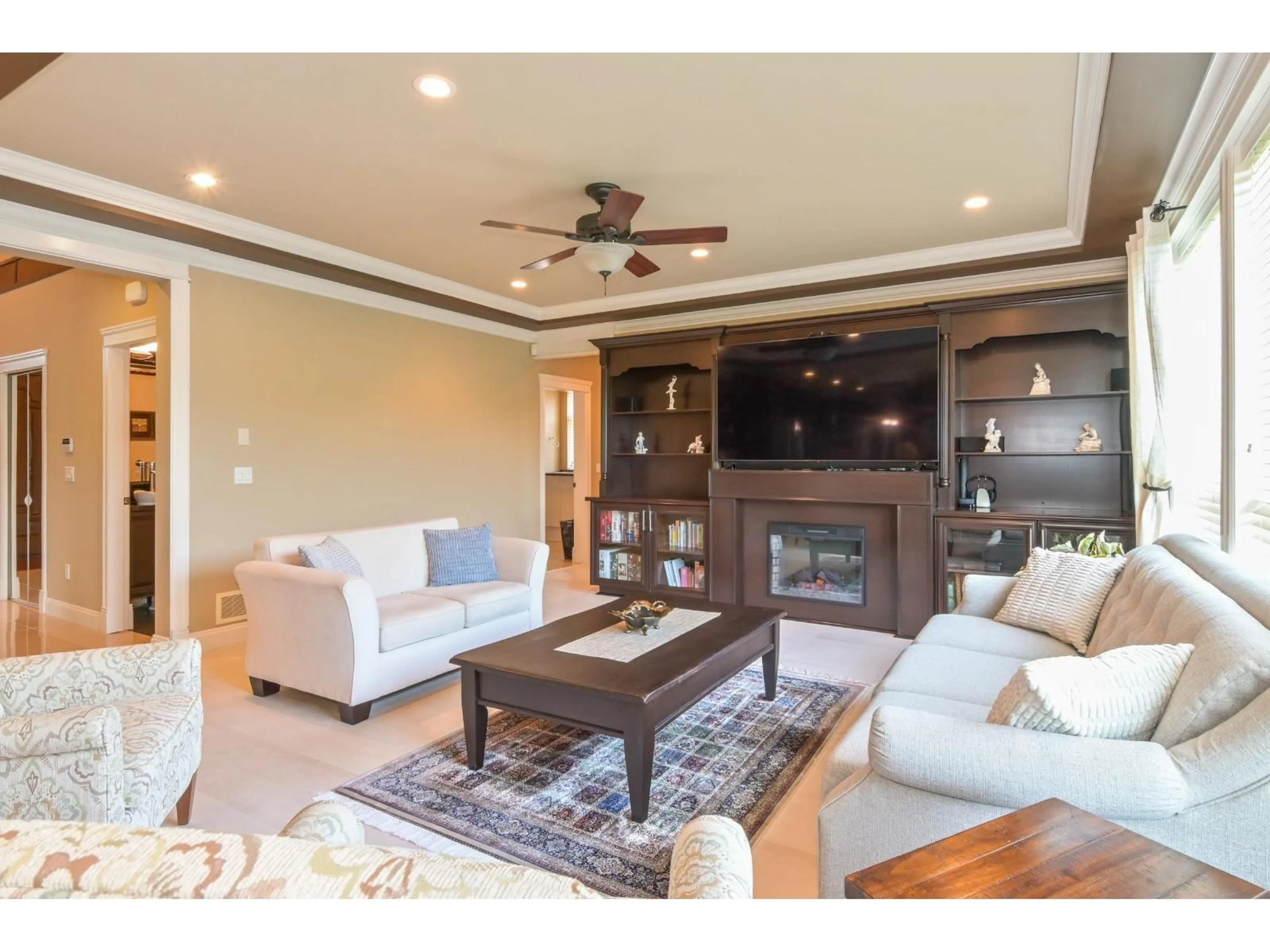 Living room with furniture, wood/laminate floor for 19698 71B AVENUE, Langley British Columbia V2Y3A4