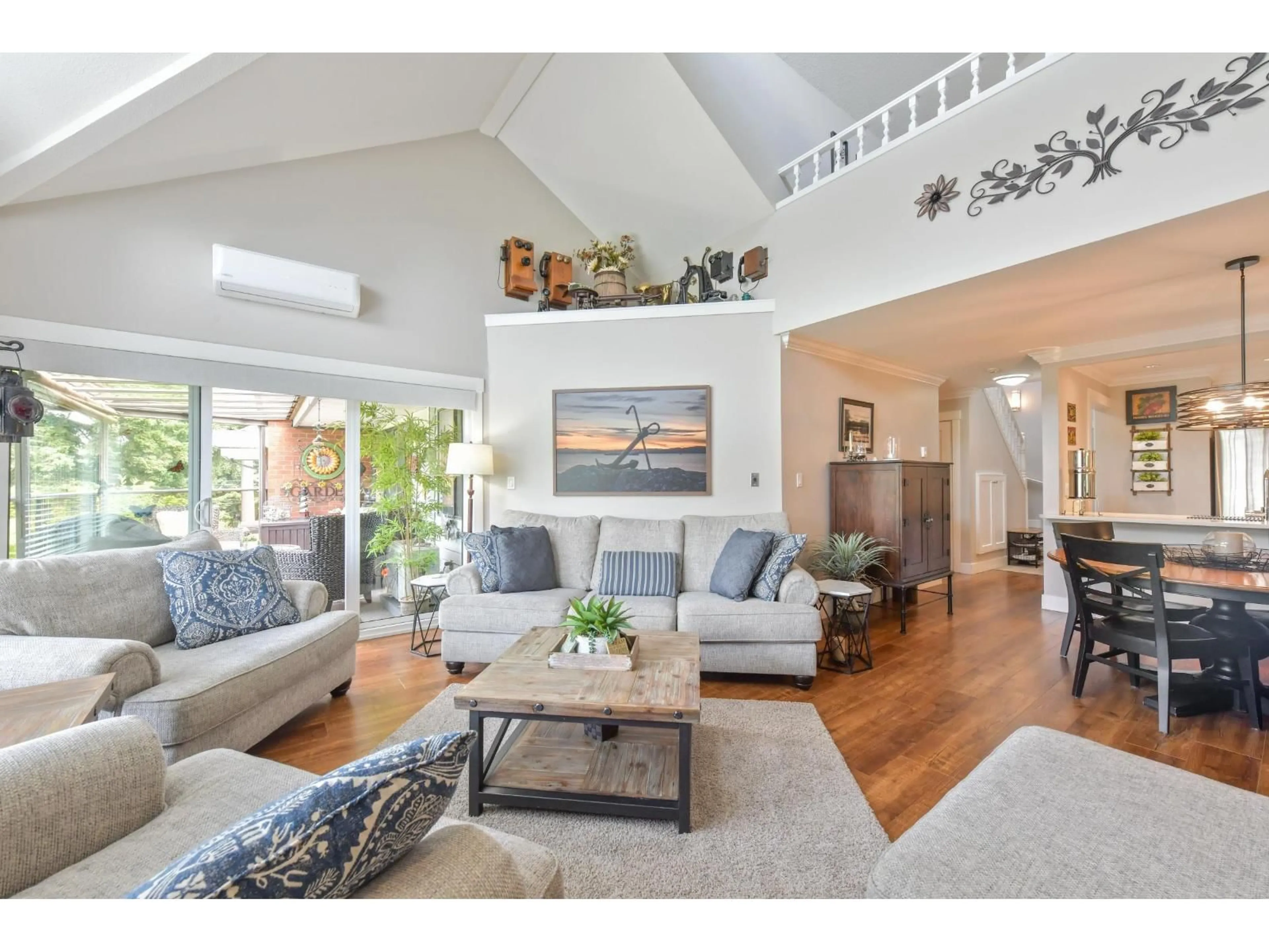 Living room with furniture, wood/laminate floor for 311 - 15270 17TH AVENUE, Surrey British Columbia V4A1T9