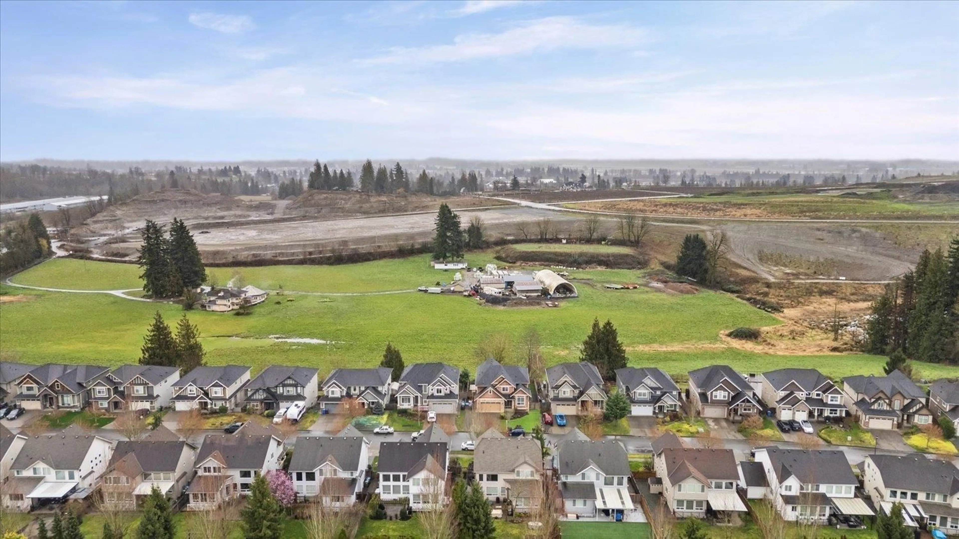 A pic from outside/outdoor area/front of a property/back of a property/a pic from drone, mountain view for 2112 MERLOT BOULEVARD, Abbotsford British Columbia V4X0A6
