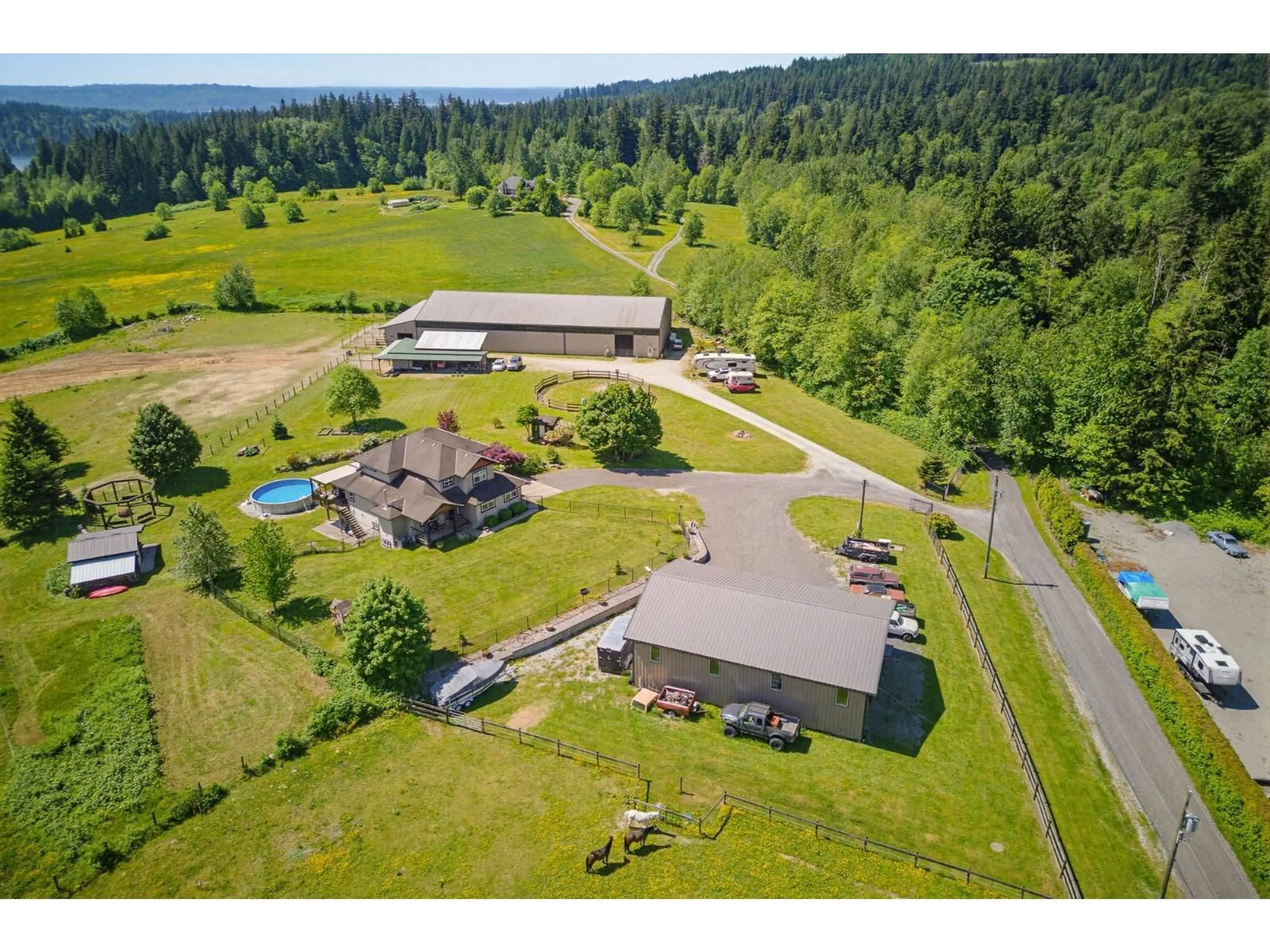 A pic from outside/outdoor area/front of a property/back of a property/a pic from drone, mountain view for 30420 DEWDNEY TRUNK ROAD, Mission British Columbia V4S1C3