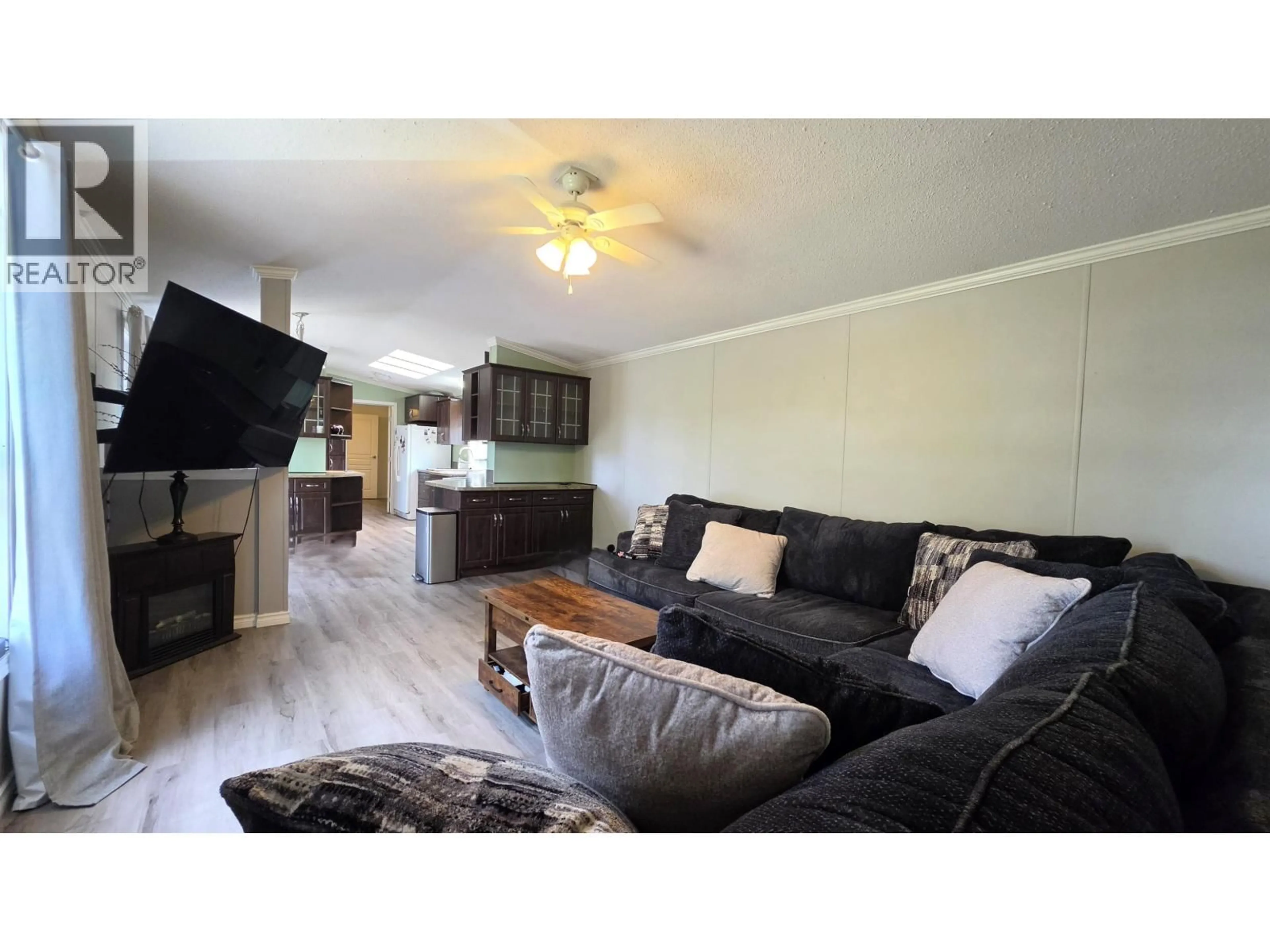 Living room with furniture, wood/laminate floor for 326 BLACKBURN ROAD, Prince George British Columbia V2N6G1