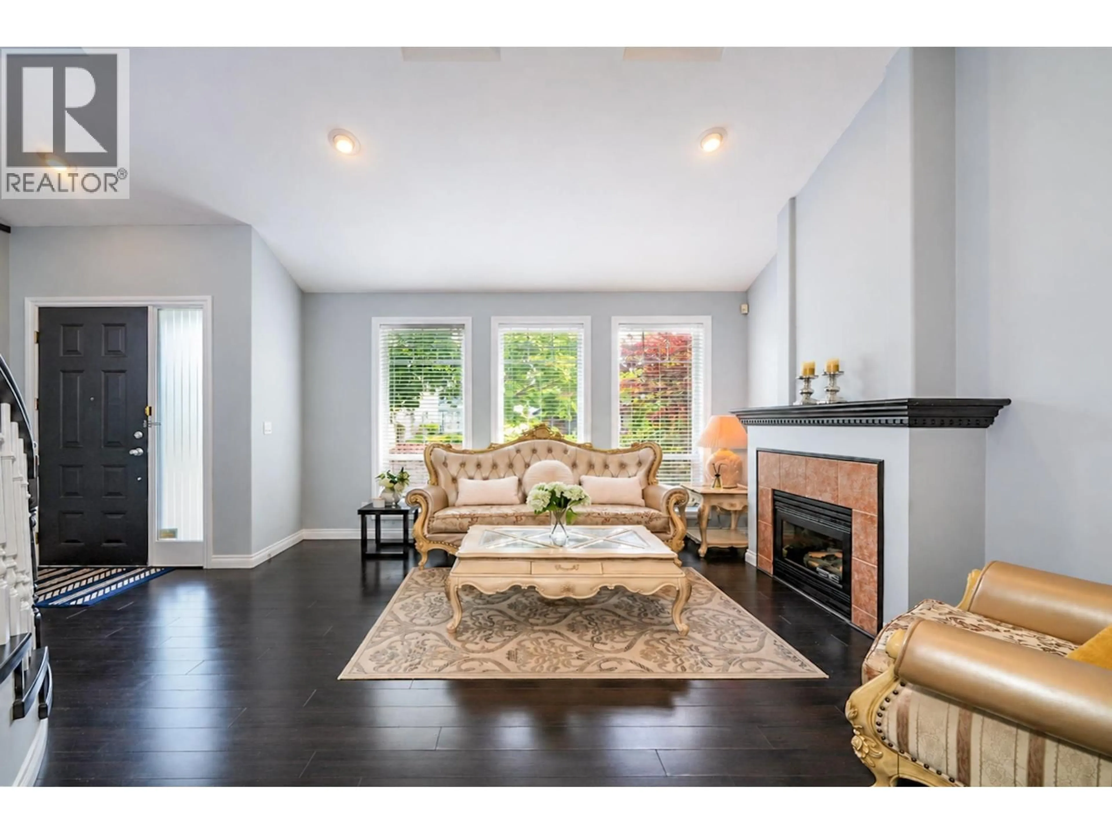 Living room with furniture, wood/laminate floor for 6833 BARNARD DRIVE, Richmond British Columbia V7C5T3