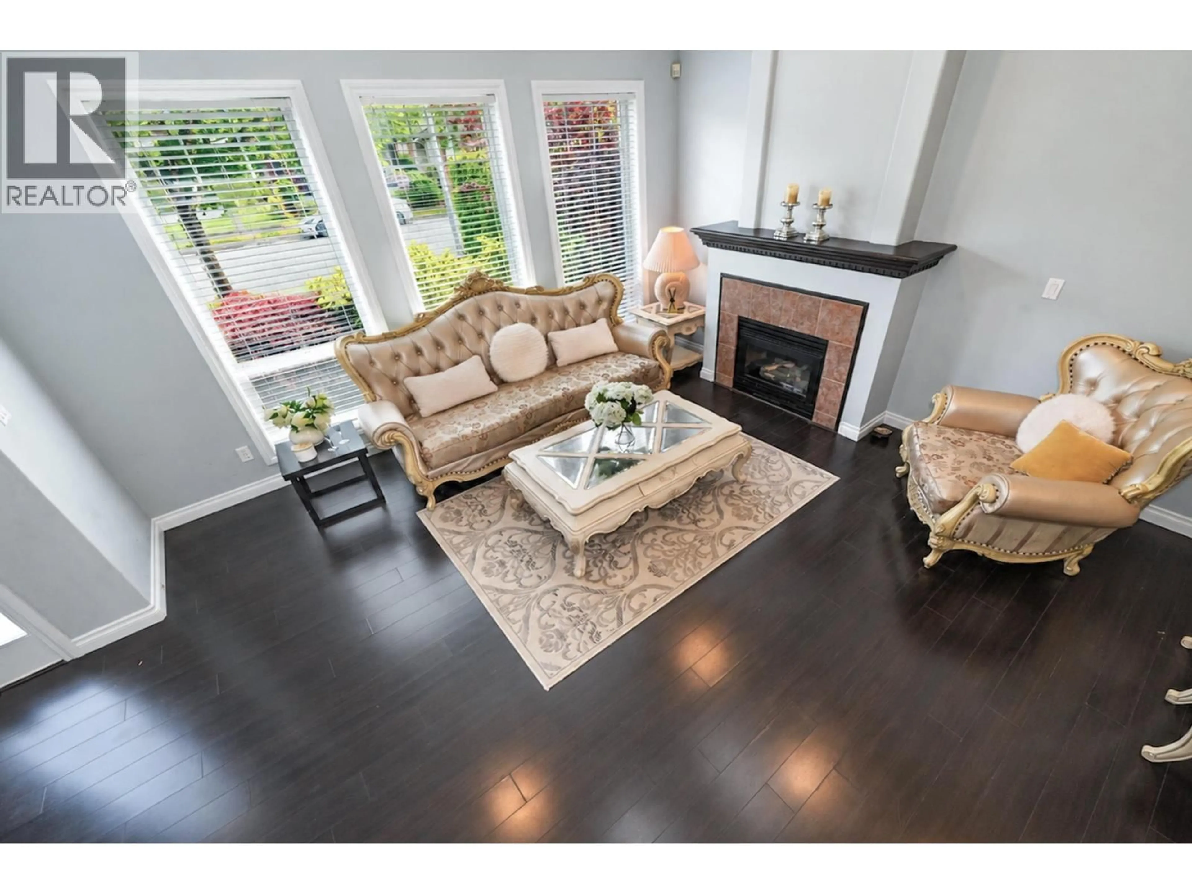 Living room with furniture, wood/laminate floor for 6833 BARNARD DRIVE, Richmond British Columbia V7C5T3