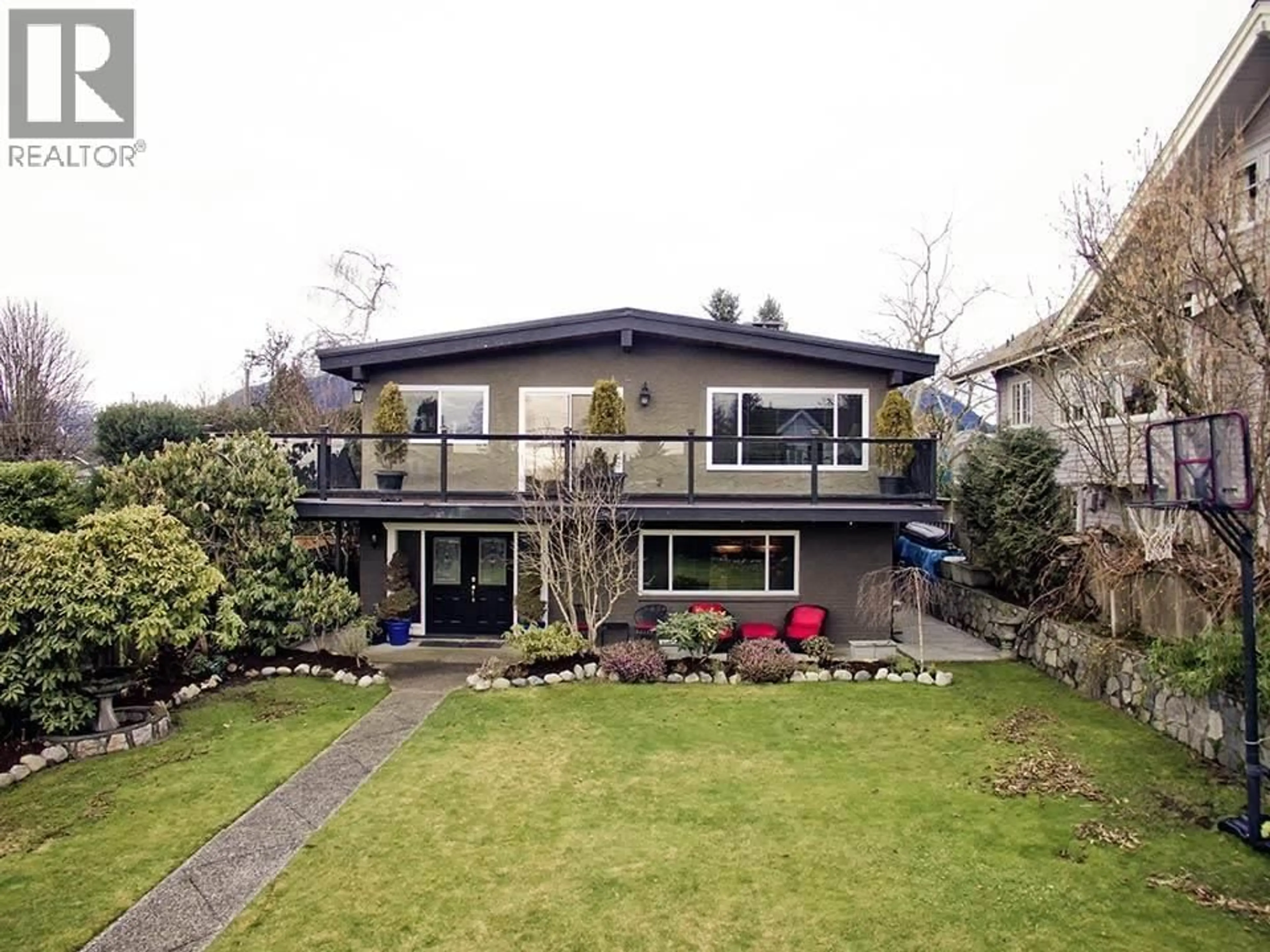 A pic from outside/outdoor area/front of a property/back of a property/a pic from drone, street for 720 9TH STREET, North Vancouver British Columbia V7L2B9