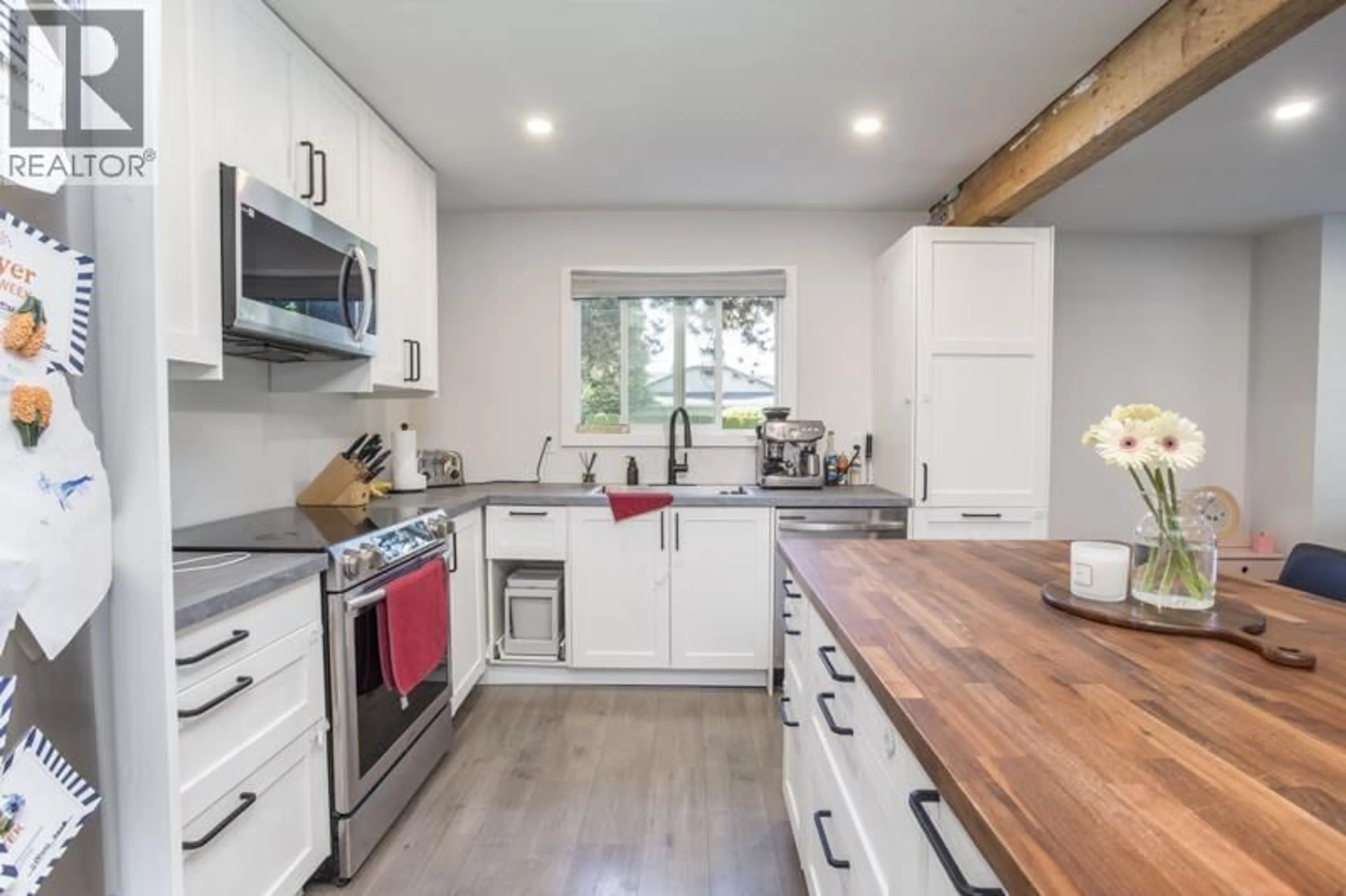 Open concept kitchen, wood/laminate floor for 55 - 12180 189A STREET, Pitt Meadows British Columbia V3Y1V8
