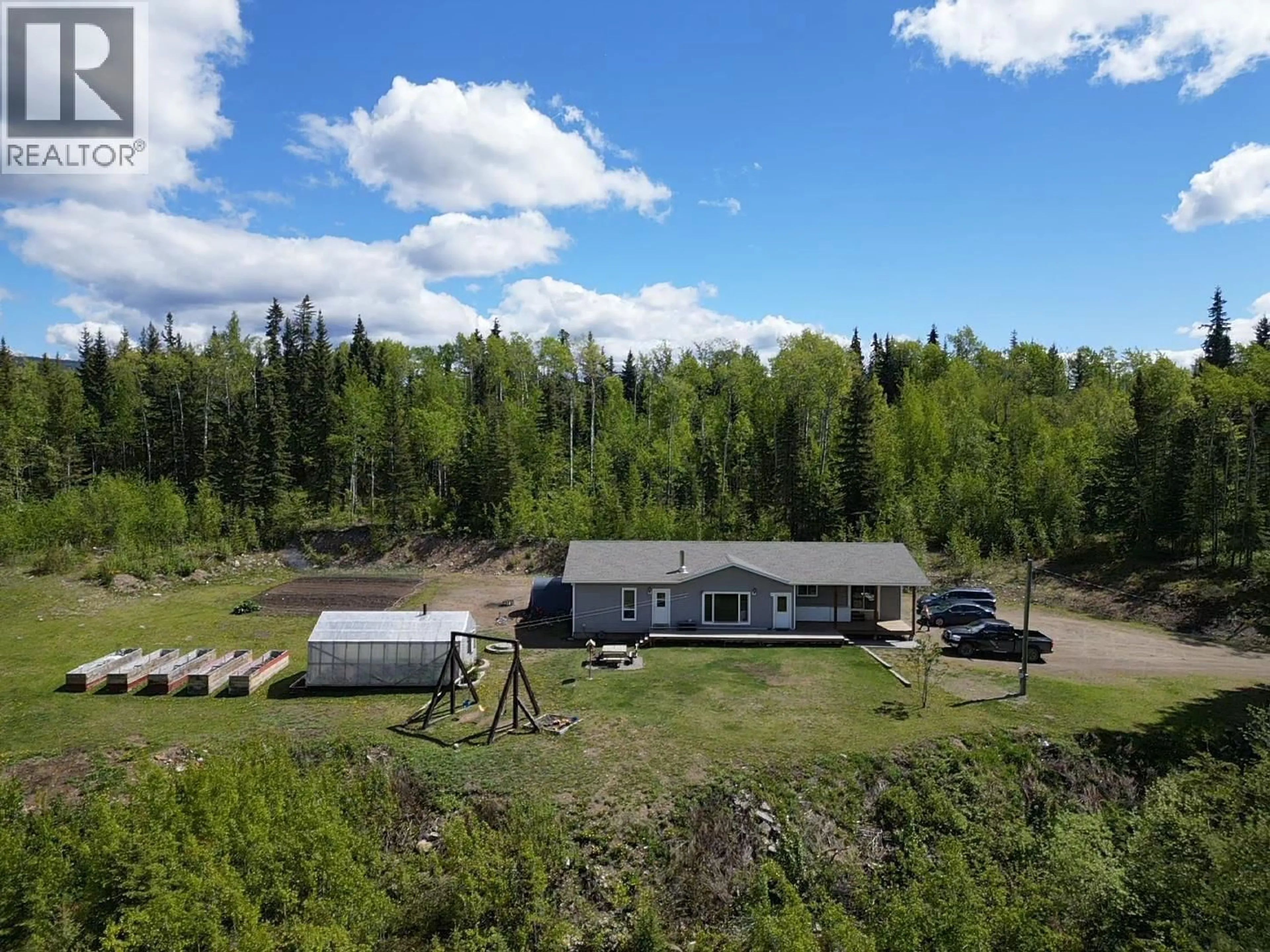 A pic from outside/outdoor area/front of a property/back of a property/a pic from drone, unknown for 100 SCHRITT CRESCENT, Burns Lake British Columbia V0J1E0