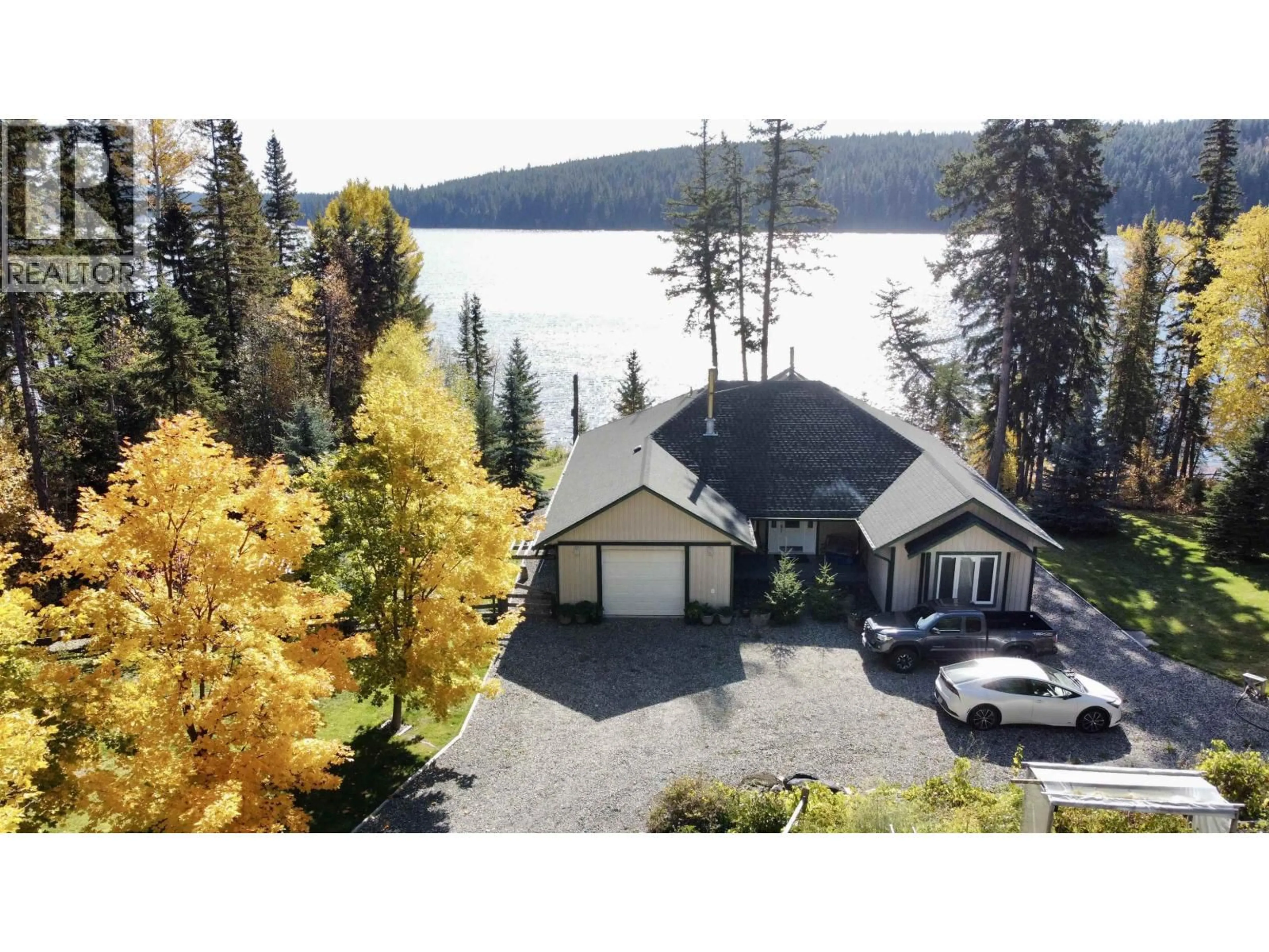 A pic from outside/outdoor area/front of a property/back of a property/a pic from drone, water/lake/river/ocean view for 5798 TIMOTHY LAKE ROAD, Lac La Hache British Columbia V0K1T0