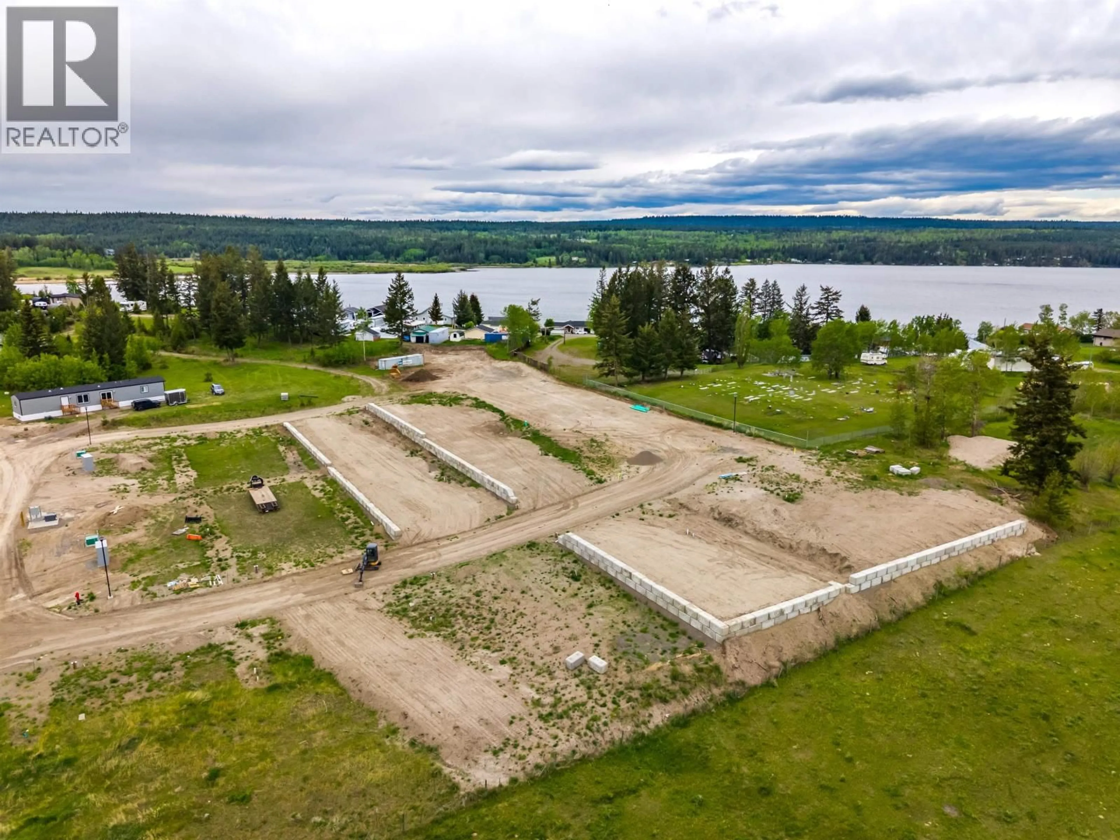 A pic from outside/outdoor area/front of a property/back of a property/a pic from drone, water/lake/river/ocean view for 59 - 4072 LAC LA HACHE STATION ROAD, Lac La Hache British Columbia V0K1T1