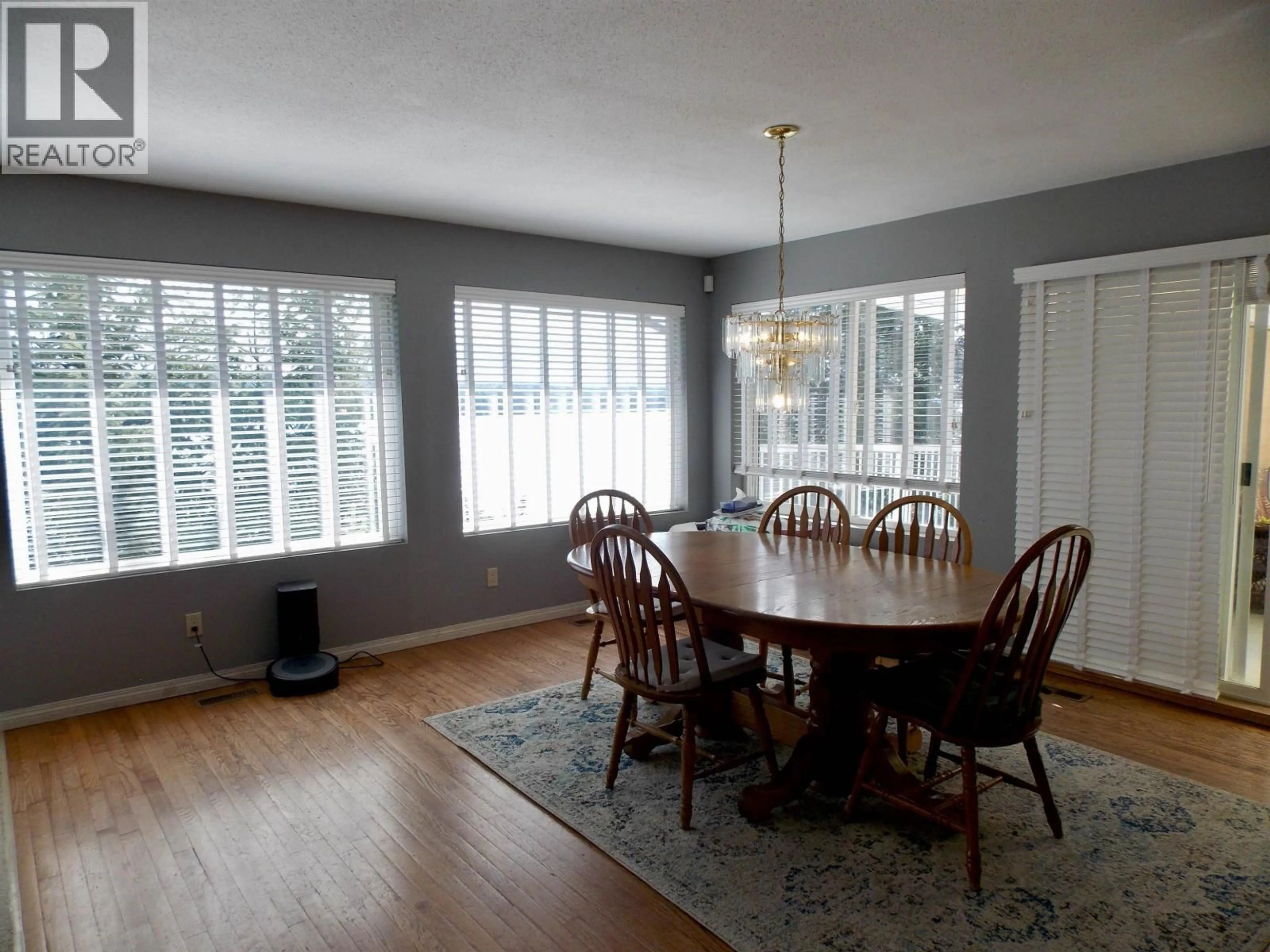 Dining room, wood/laminate floor for 4126 MCKINLEY DRIVE, Lac La Hache British Columbia V0K1T0