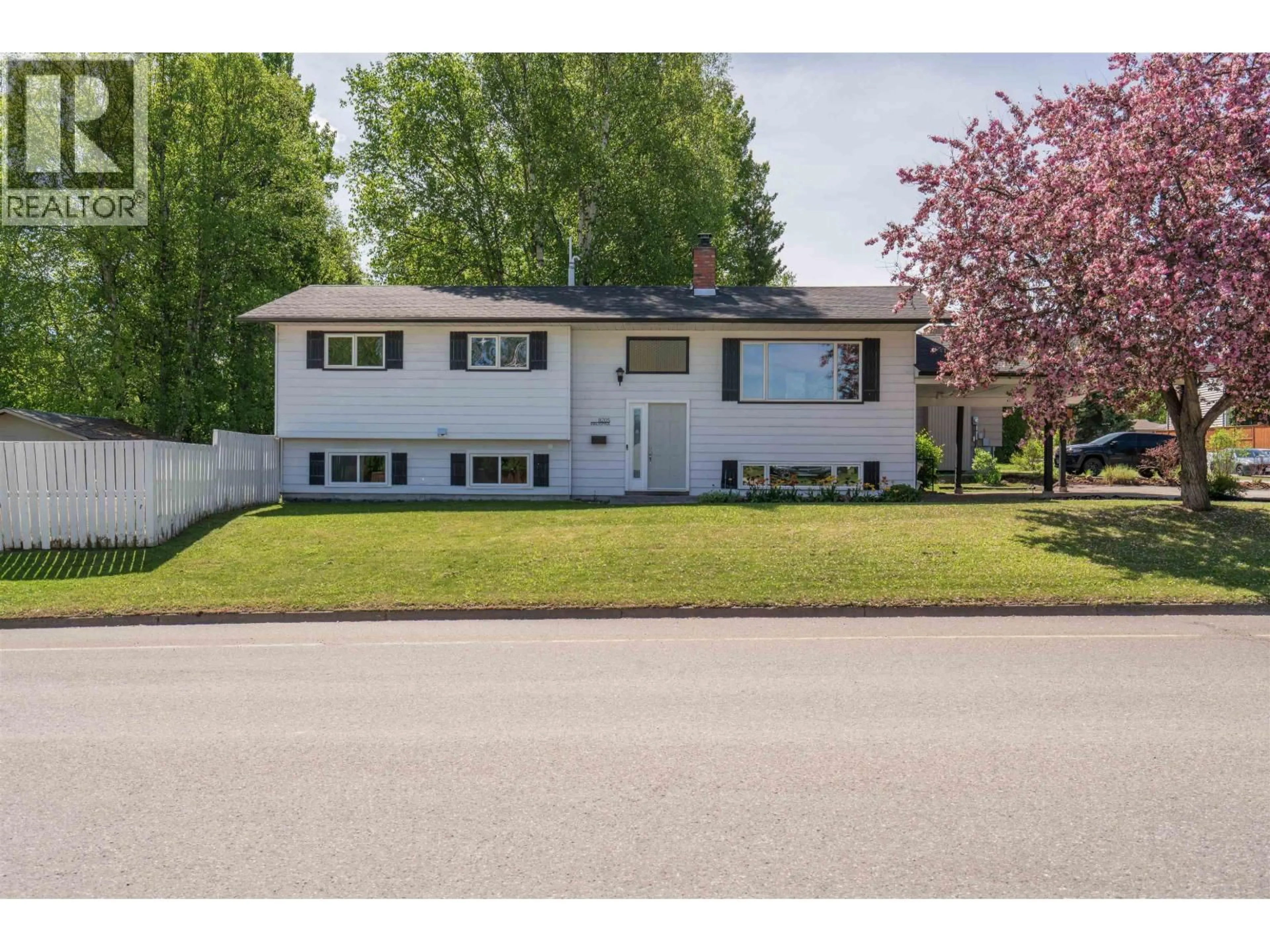 Home with vinyl exterior material, street for 8205 MALASPINA AVENUE, Prince George British Columbia V2L2P3