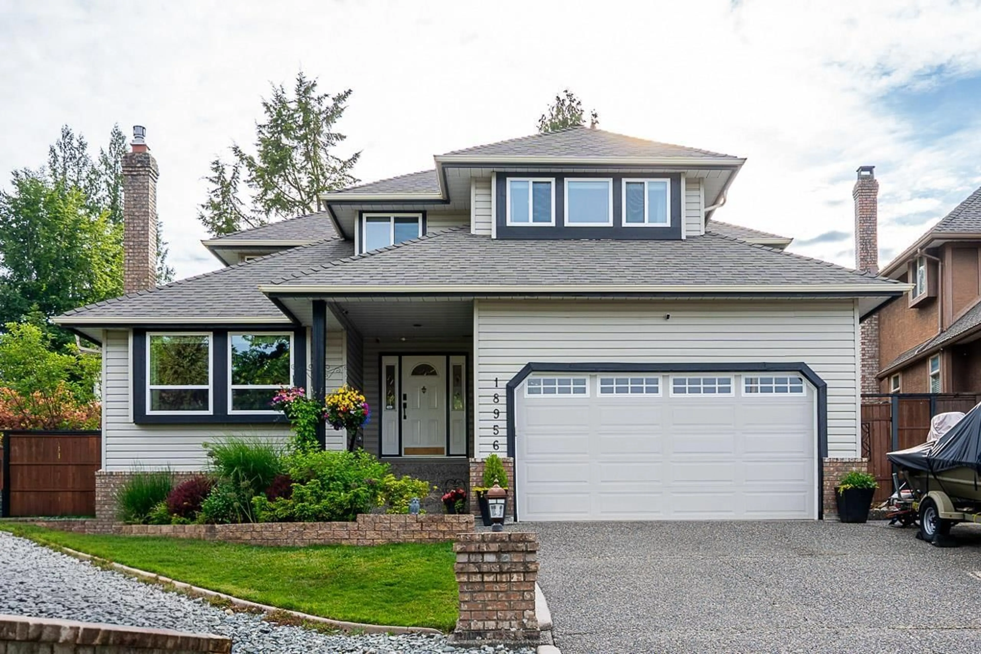 Home with vinyl exterior material, street for 18956 59 AVENUE, Surrey British Columbia V3S7R8