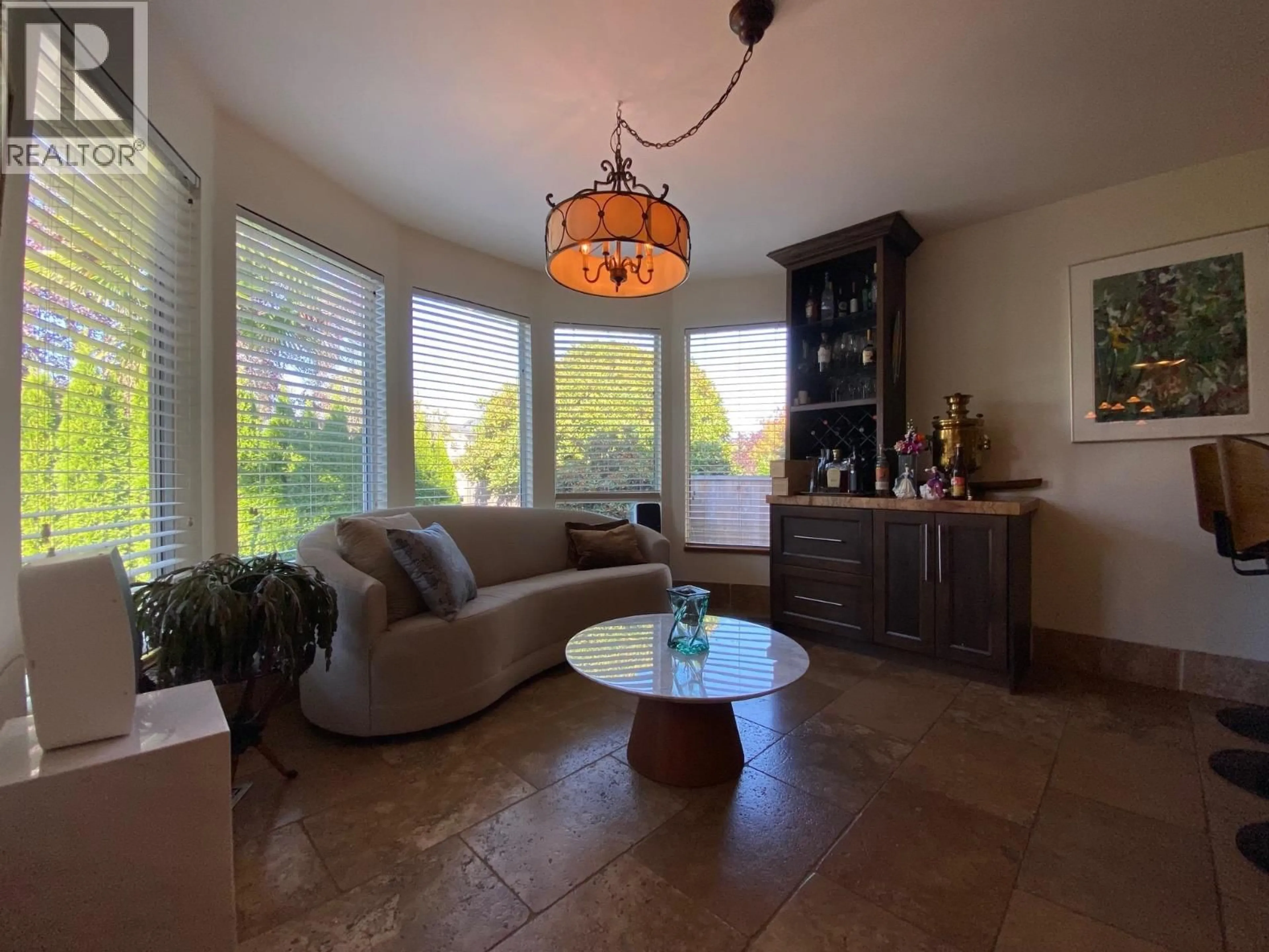 Living room with furniture, ceramic/tile floor for 2938 23RD AVENUE, Vancouver British Columbia V6L1P5