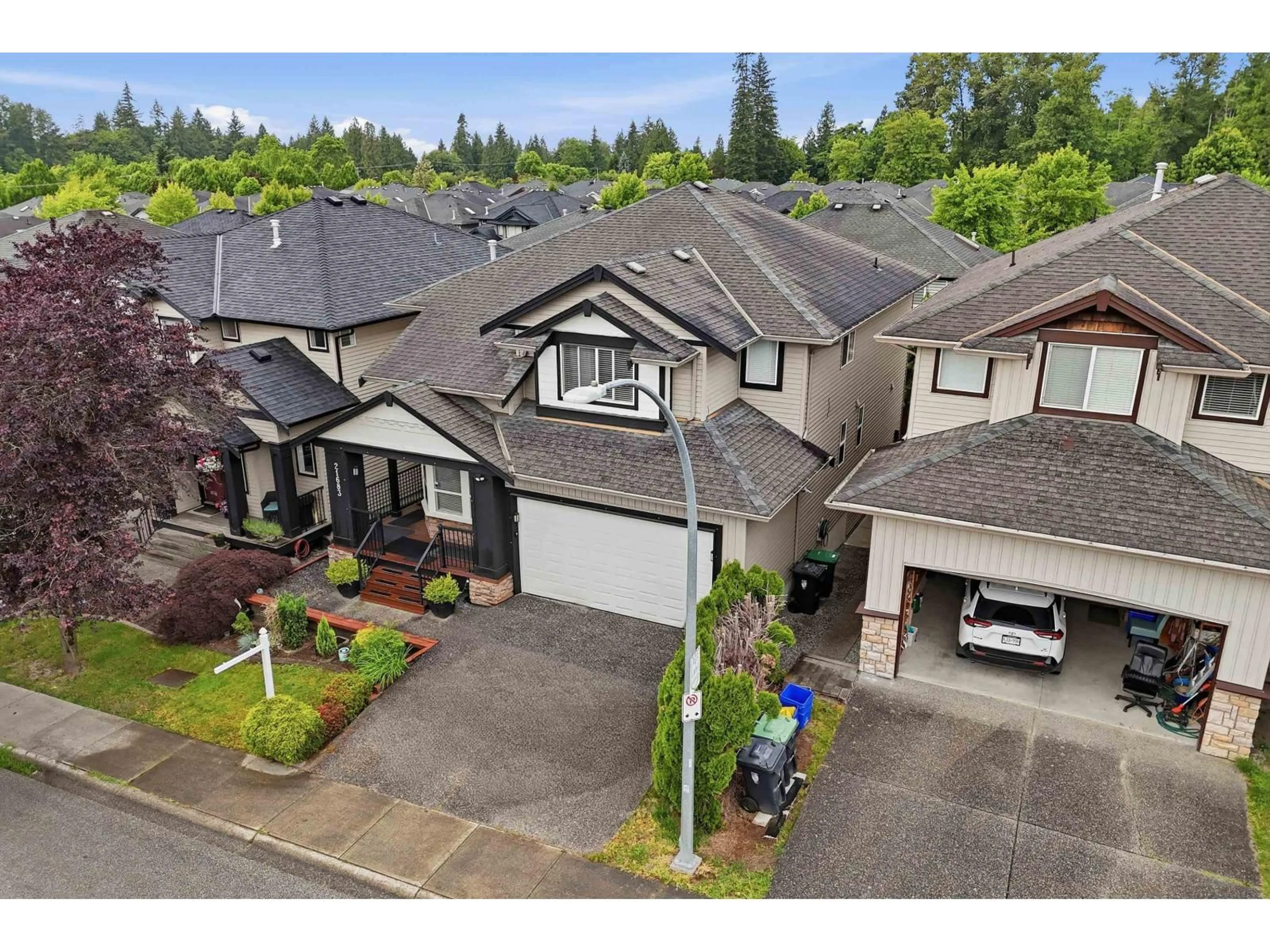 A pic from outside/outdoor area/front of a property/back of a property/a pic from drone, street for 21683 89A AVENUE, Langley British Columbia V1M4C7