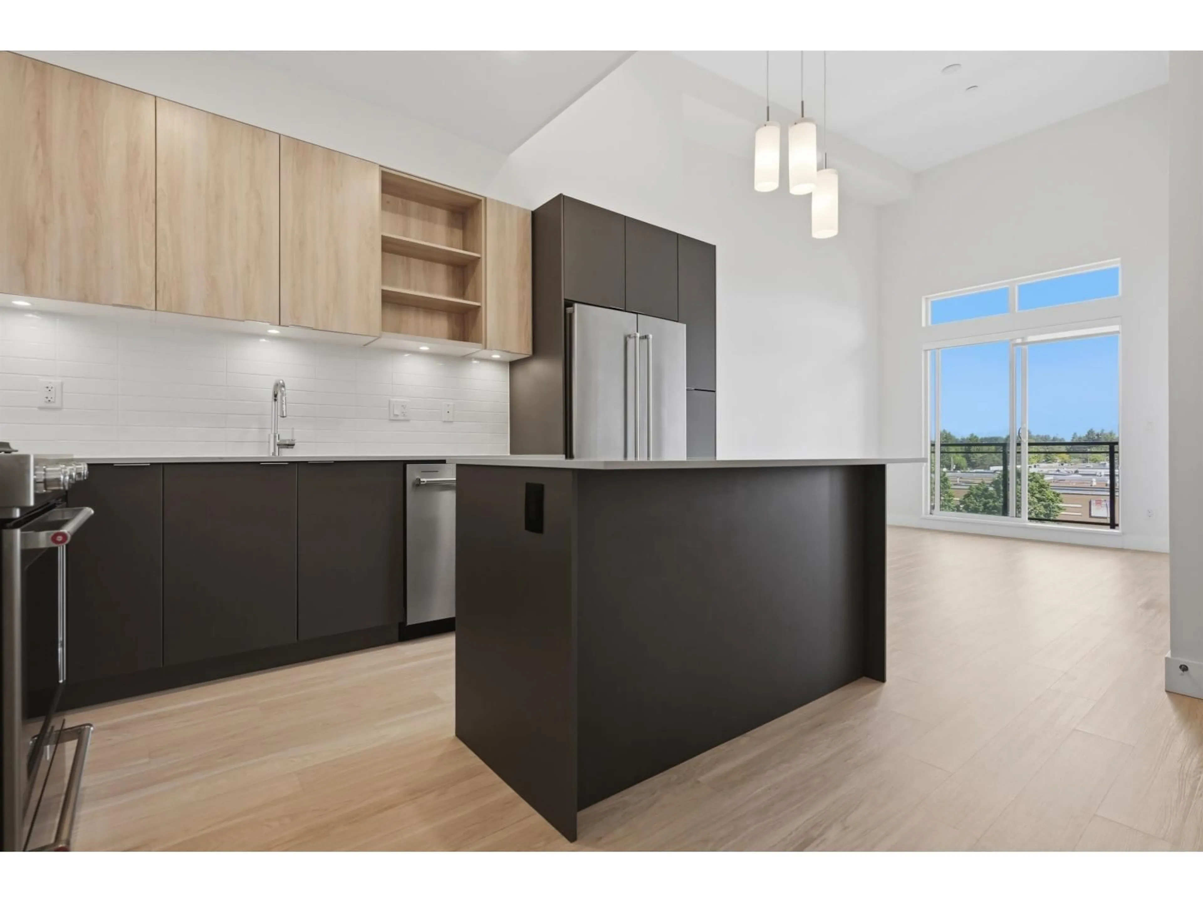 Open concept kitchen, wood/laminate floor for 609 - 6960 NICHOLSON ROAD, Delta British Columbia V4E0A9