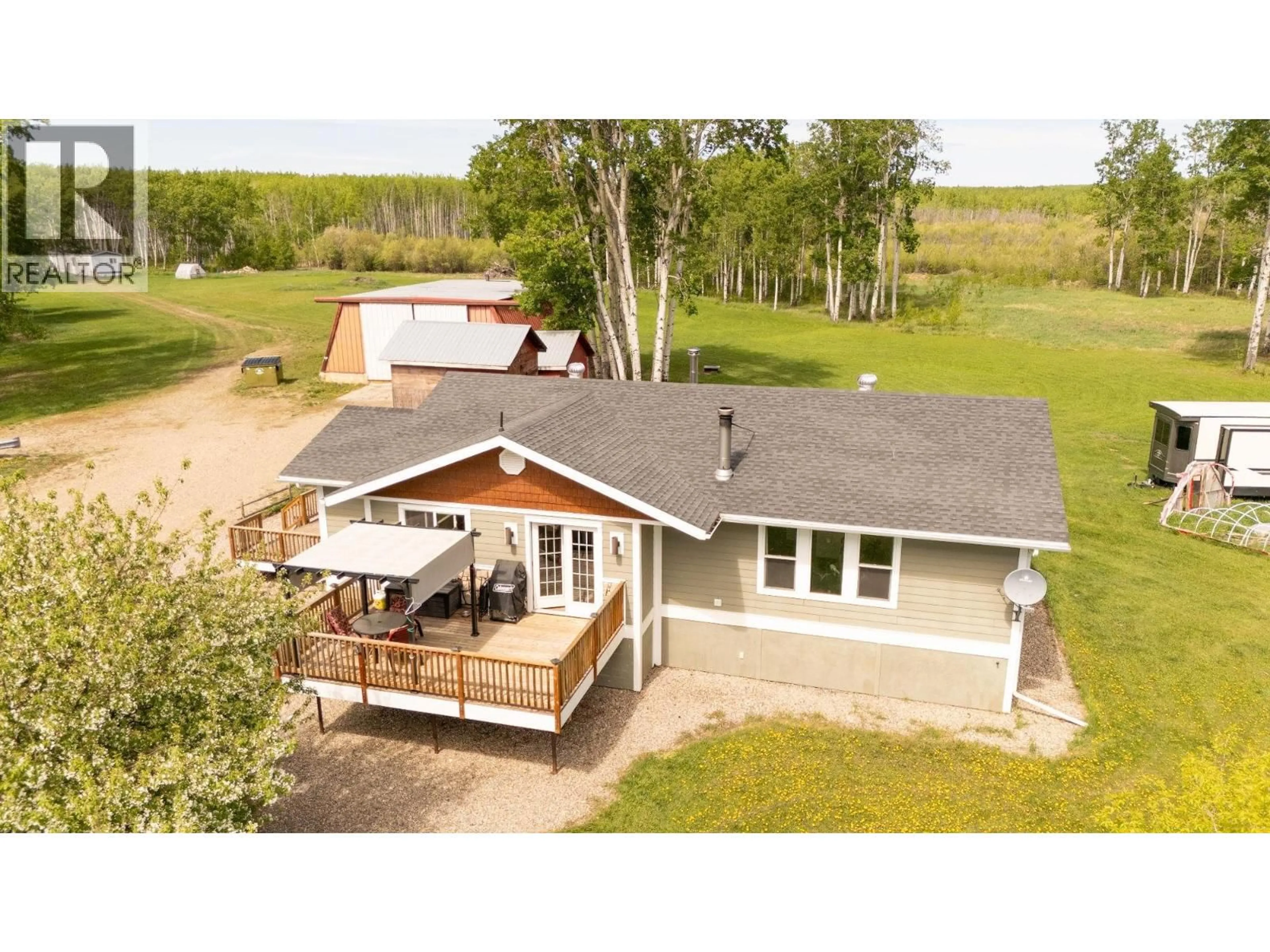 A pic from outside/outdoor area/front of a property/back of a property/a pic from drone, unknown for 1016 240 ROAD, Fort St. John British Columbia V0C1K0