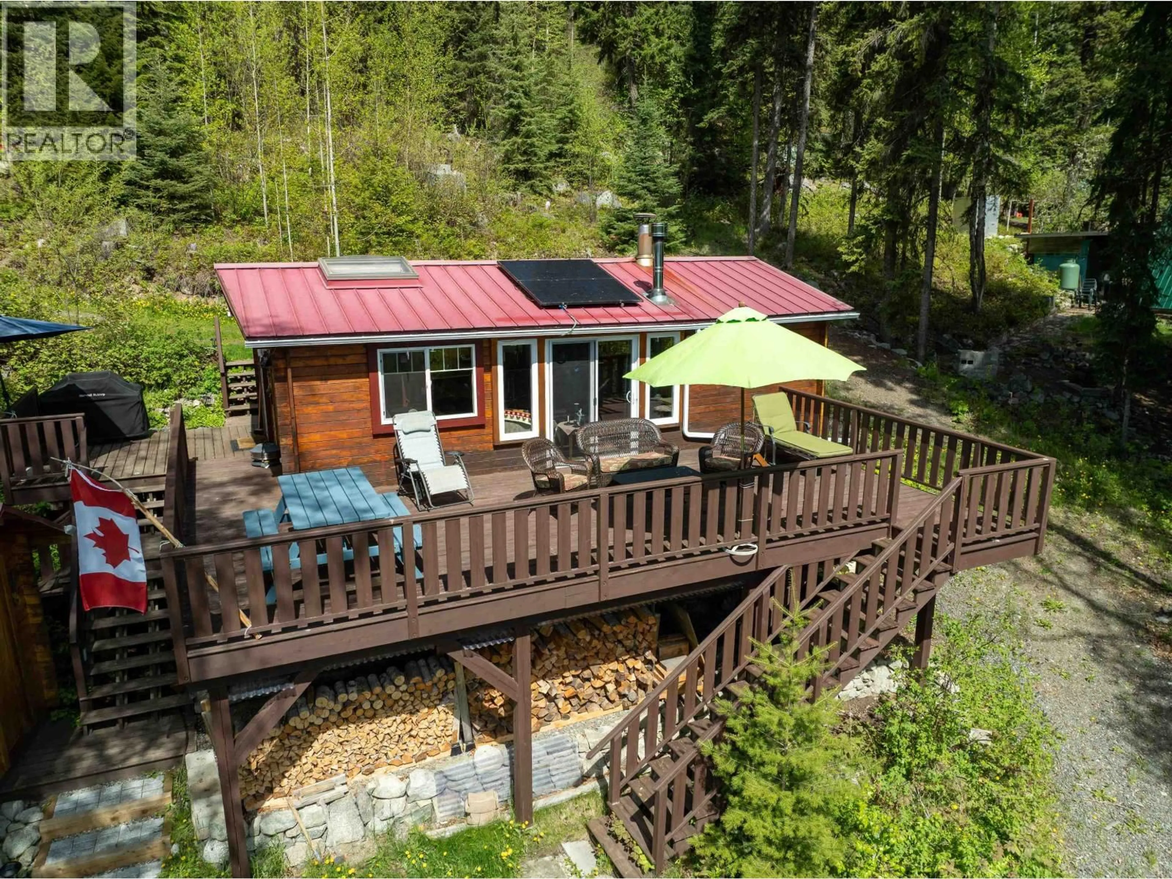 A pic from outside/outdoor area/front of a property/back of a property/a pic from drone, forest/trees view for 4384 BIRCH LAKE DUMP ROAD, Bridge Lake British Columbia V0K1E0