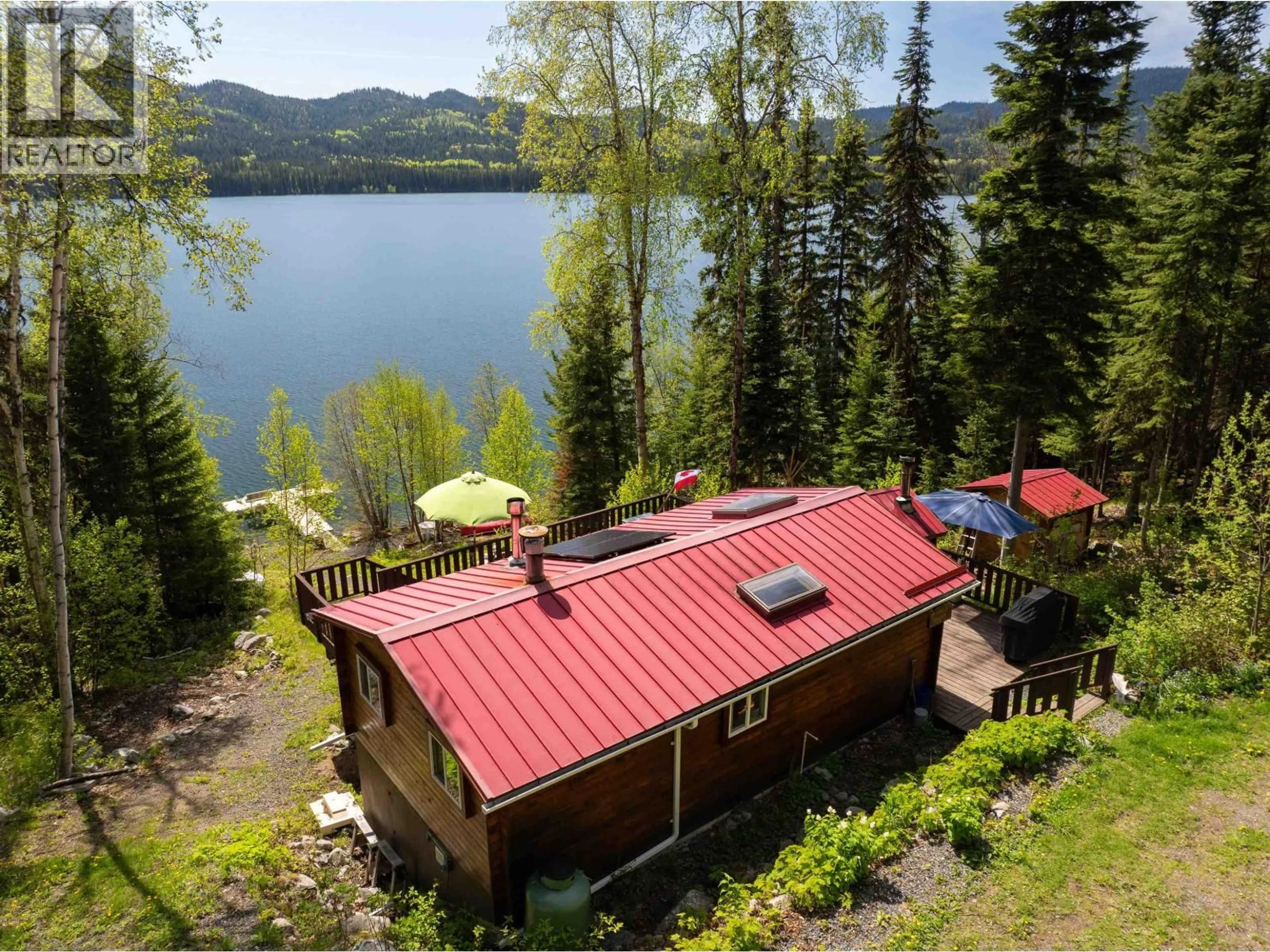 A pic from outside/outdoor area/front of a property/back of a property/a pic from drone, water/lake/river/ocean view for 4384 BIRCH LAKE DUMP ROAD, Bridge Lake British Columbia V0K1E0