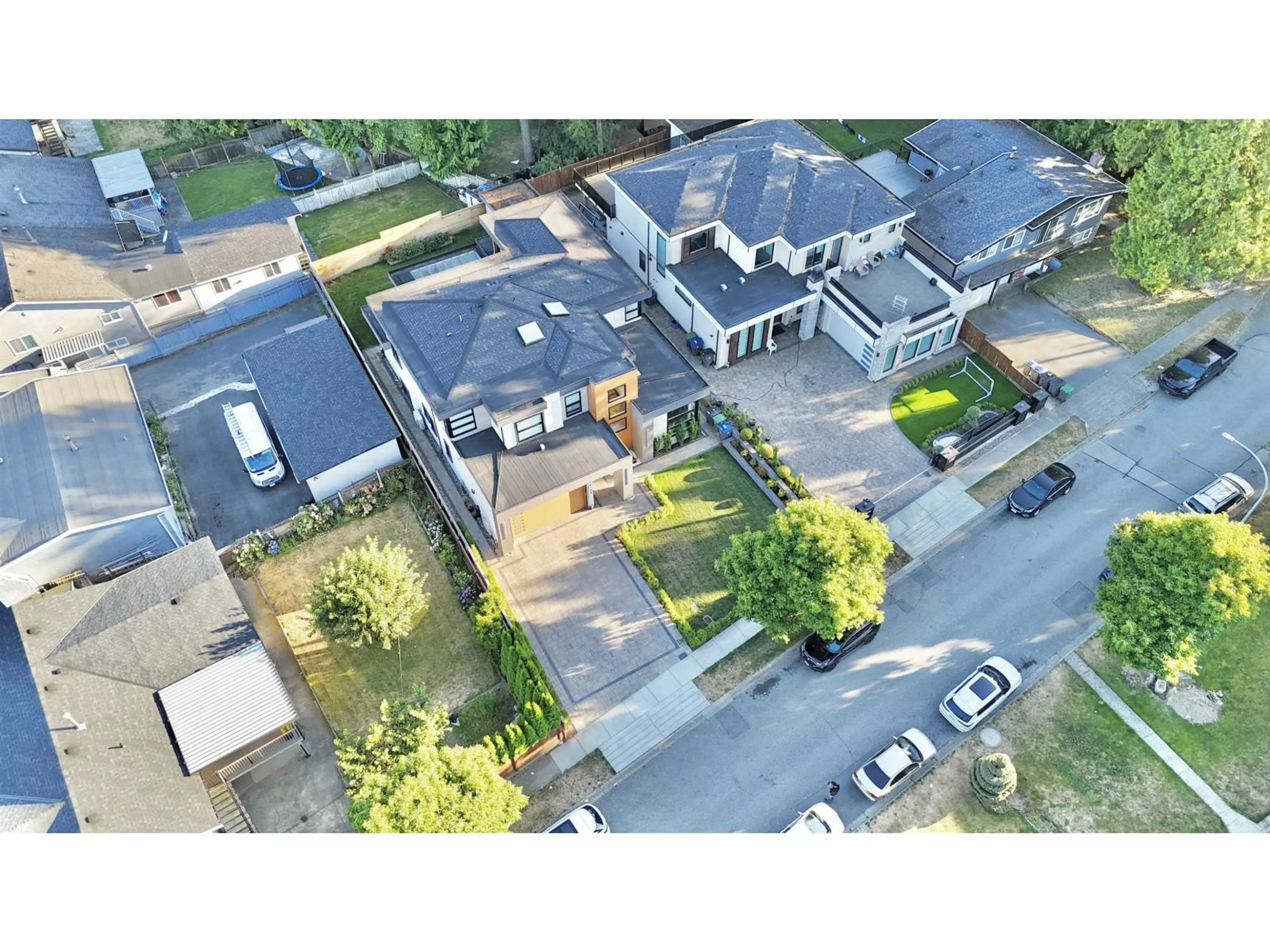 A pic from outside/outdoor area/front of a property/back of a property/a pic from drone, street for 14124 71 AVENUE, Surrey British Columbia V3W5V3