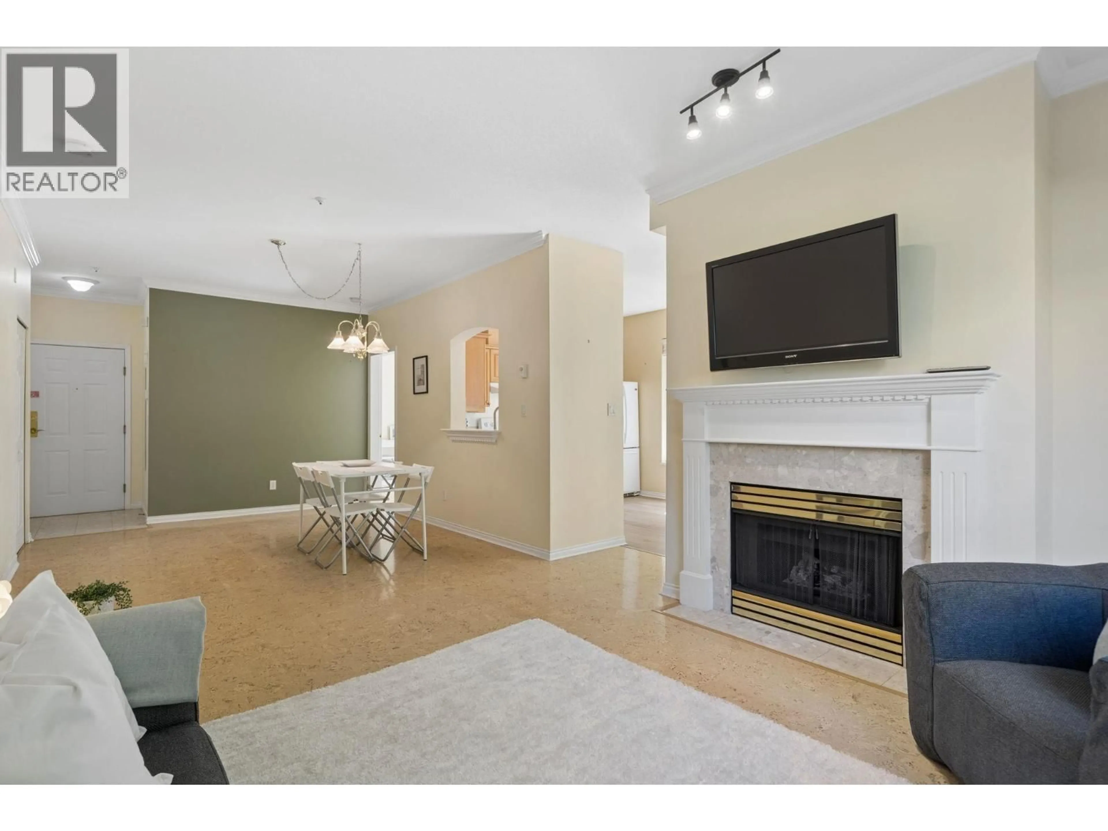 Living room with furniture, unknown for 118 - 3098 GUILDFORD WAY, Coquitlam British Columbia V3B7W8