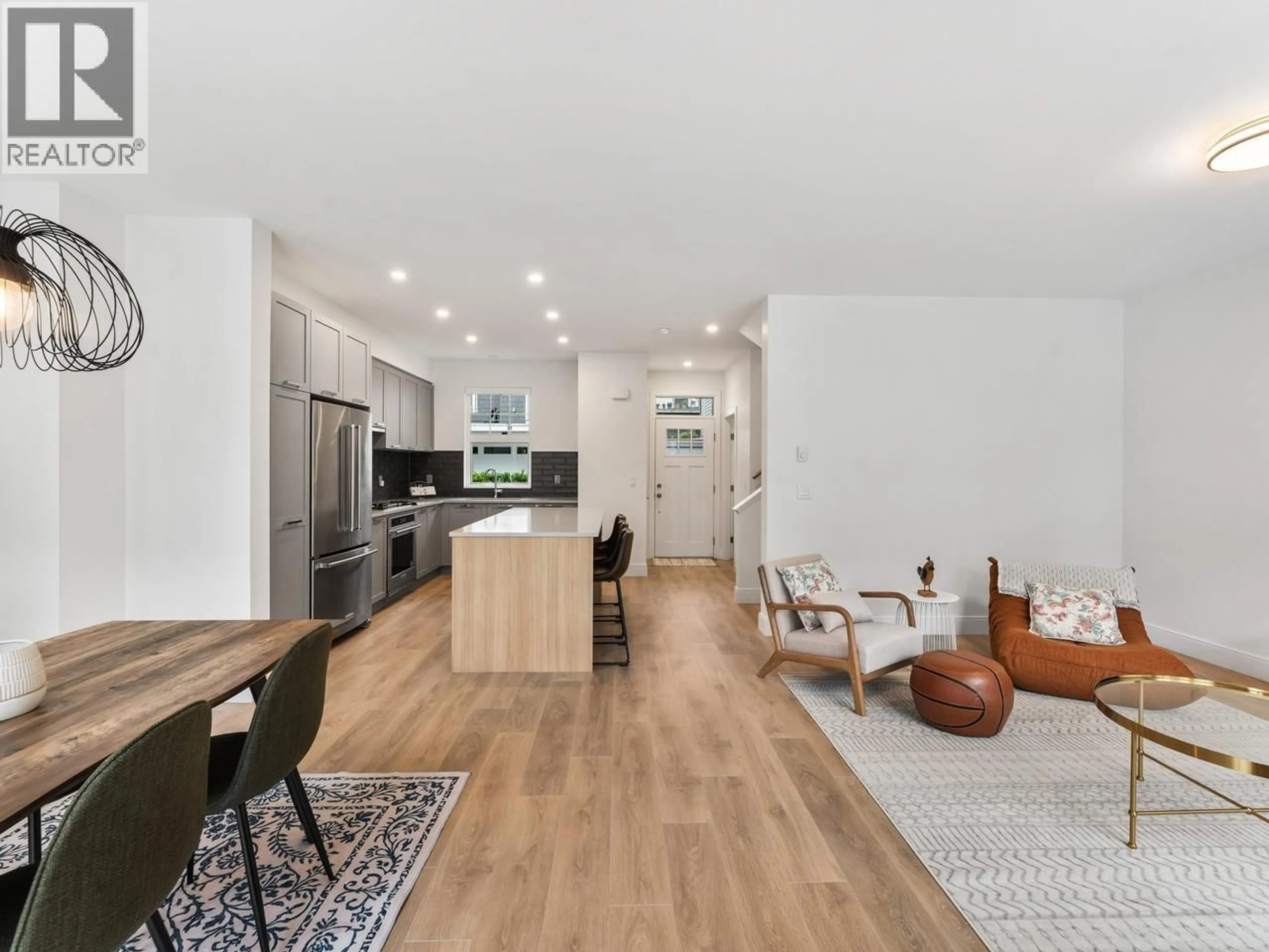Open concept kitchen, wood/laminate floor for 201 - 1310 MITCHELL STREET, Coquitlam British Columbia V3E0T9