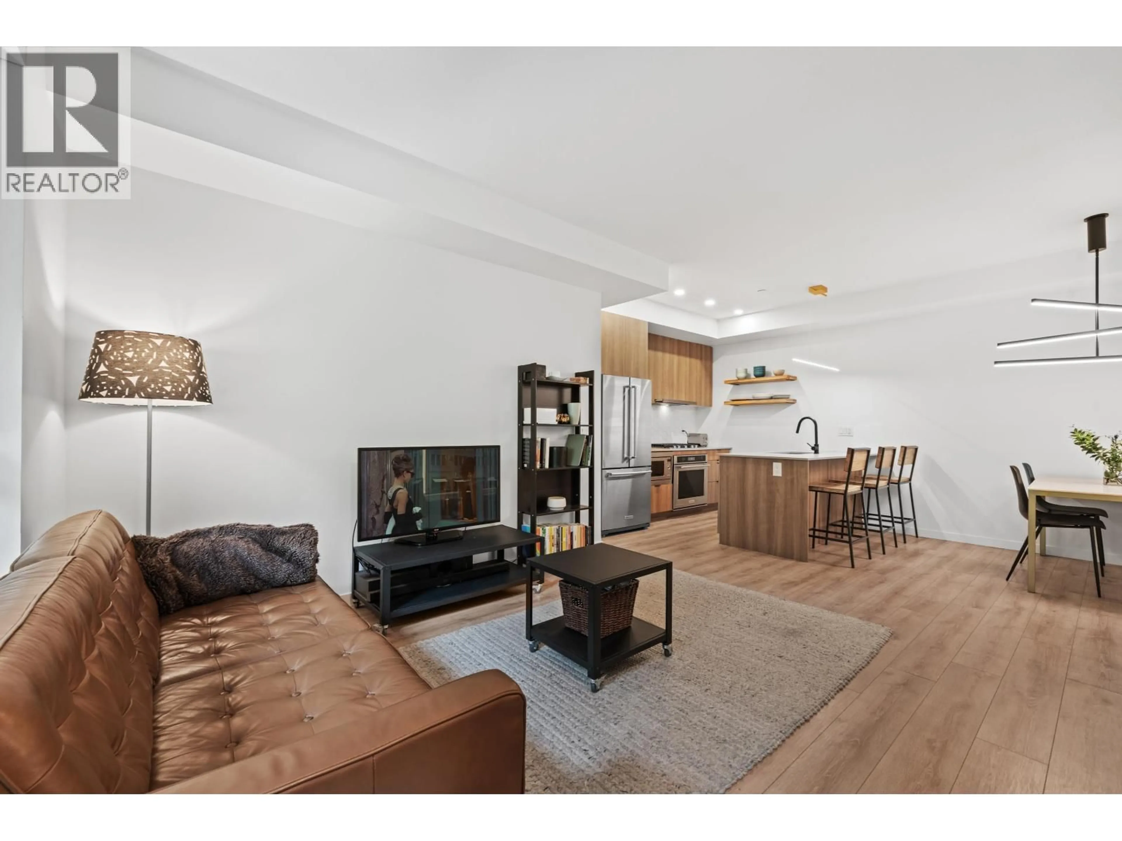 Living room with furniture, wood/laminate floor for 29 - 533 3RD STREET, North Vancouver British Columbia V7L1G4