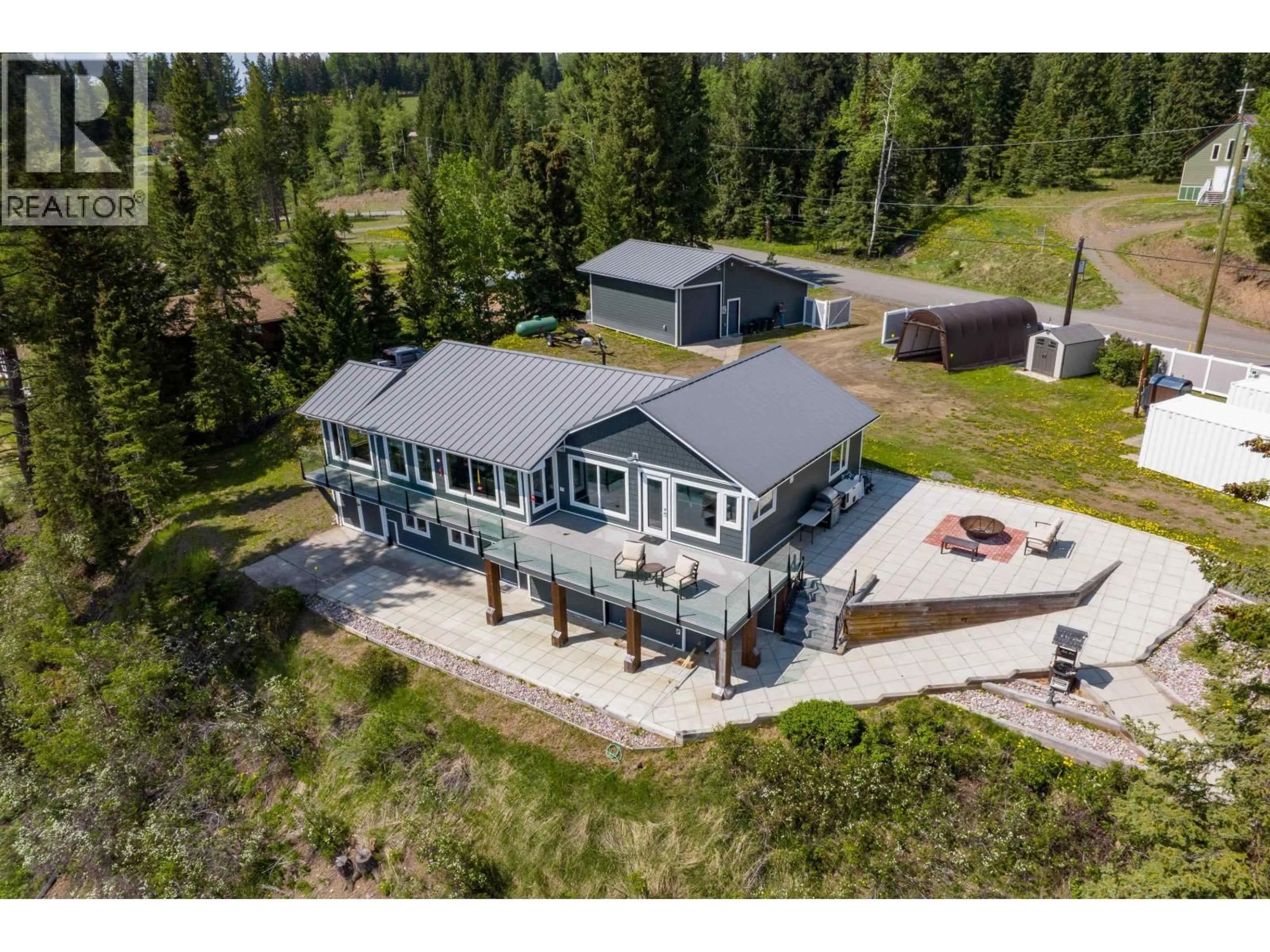 A pic from outside/outdoor area/front of a property/back of a property/a pic from drone, unknown for 8046 BRIDGE LAKE ROAD, Bridge Lake British Columbia V0K1X2