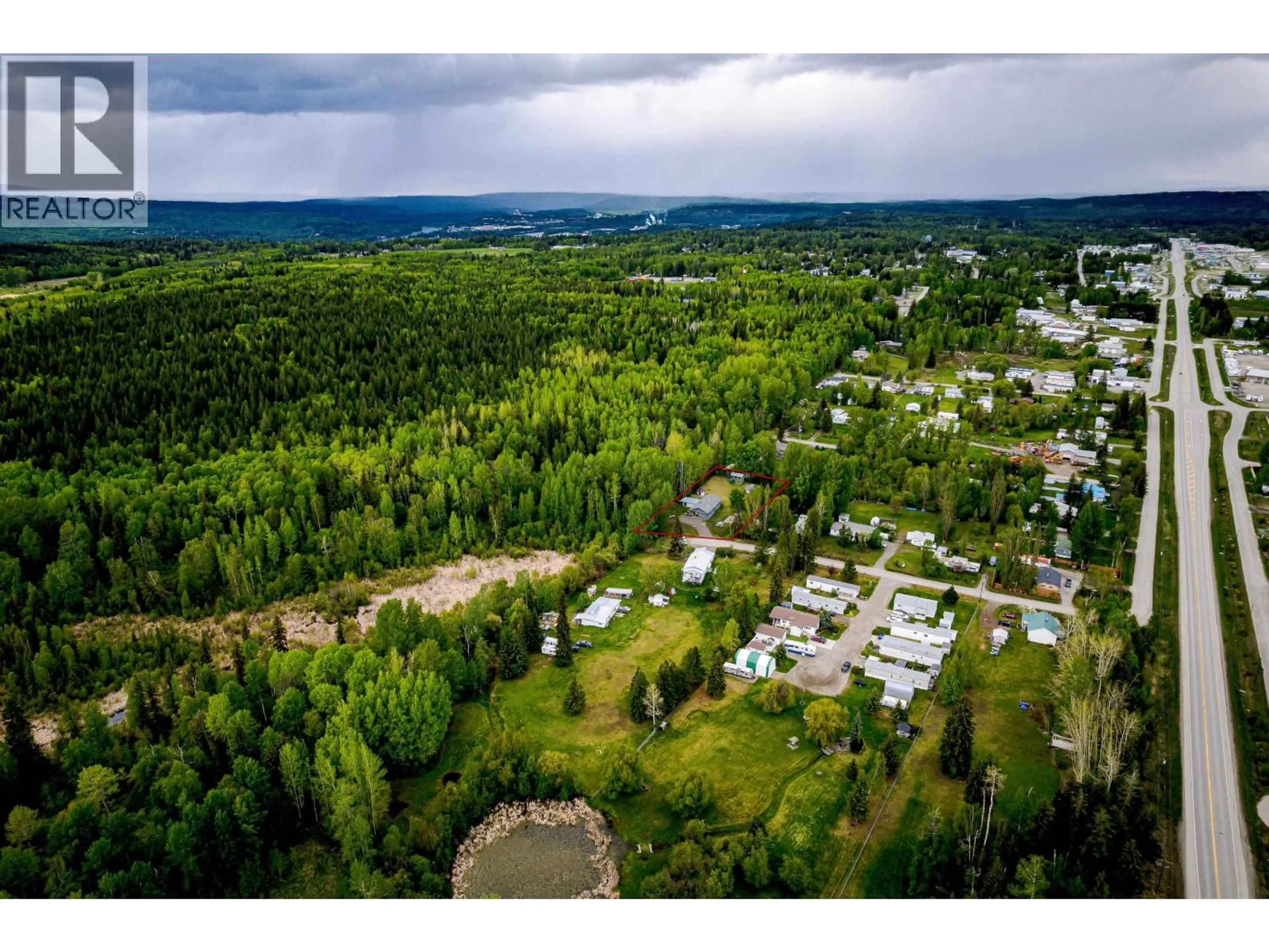A pic from outside/outdoor area/front of a property/back of a property/a pic from drone, forest/trees view for 2102 QUARTZ ROAD, Quesnel British Columbia V2J4N7