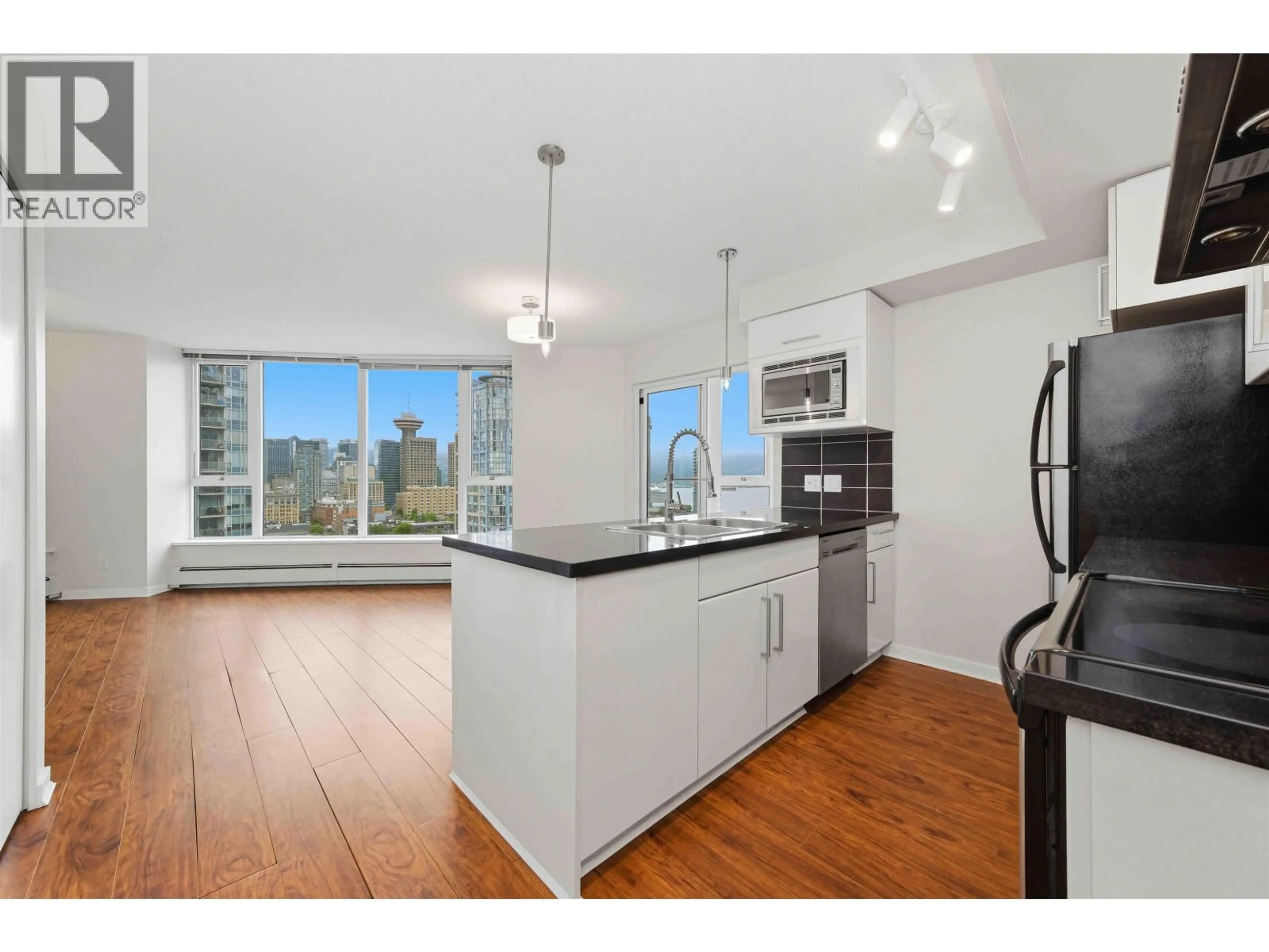 Open concept kitchen, wood/laminate floor for 2901 - 689 ABBOTT STREET, Vancouver British Columbia V6B0J2