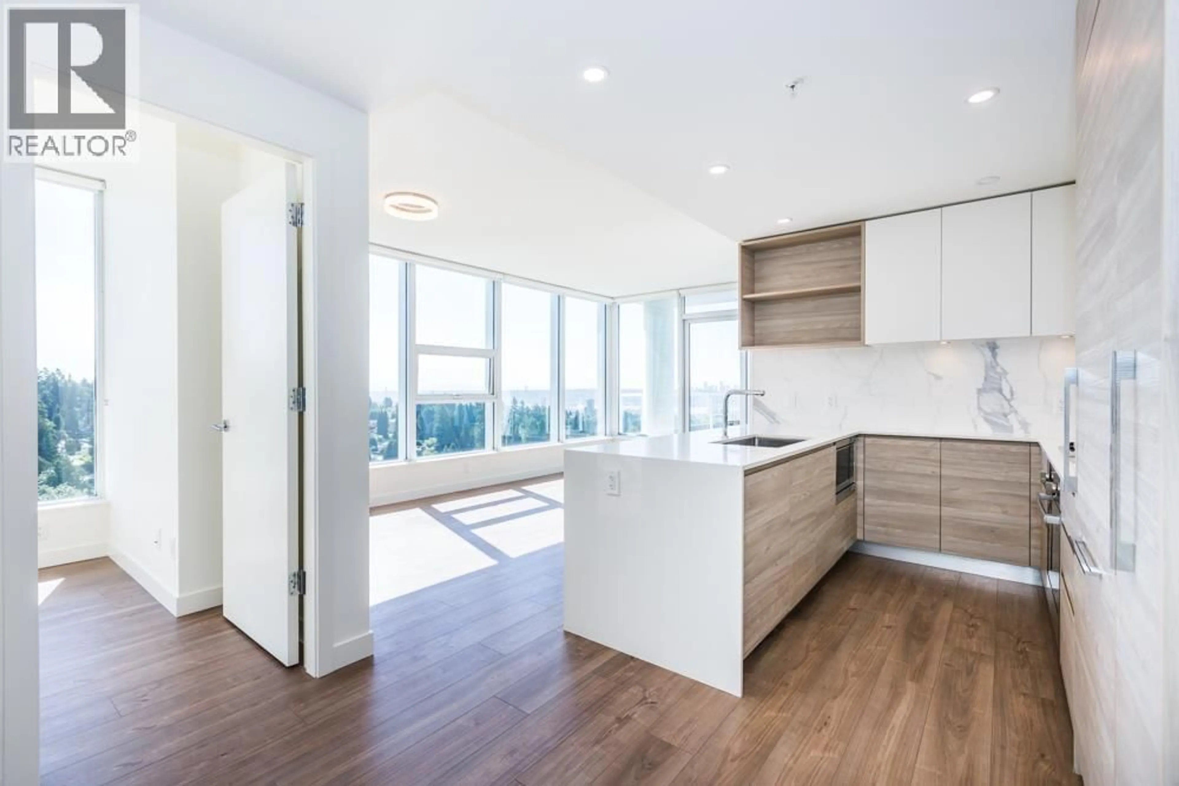 Open concept kitchen, wood/laminate floor for 2005 - 585 AUSTIN AVENUE, Coquitlam British Columbia V3K0G6