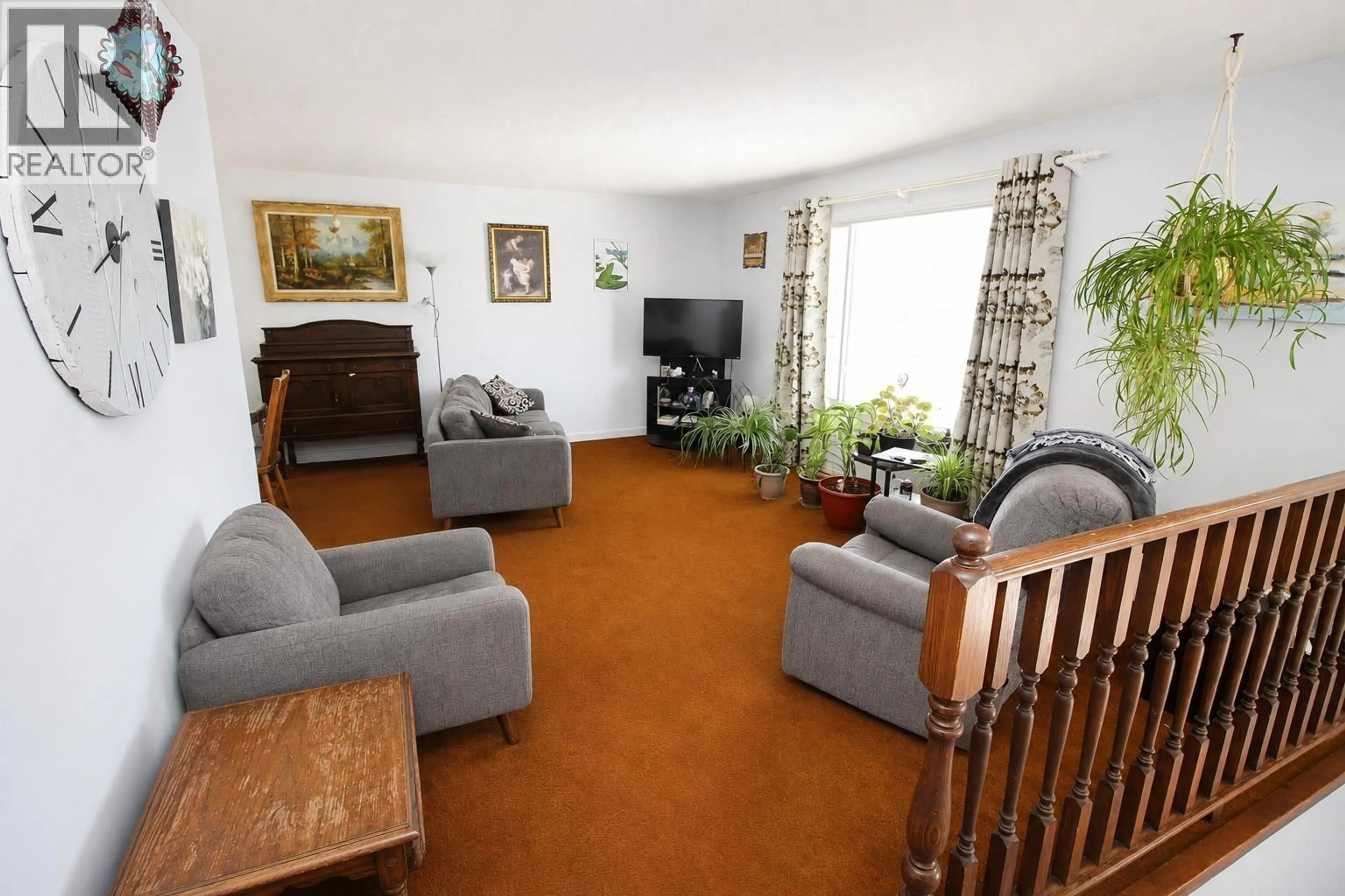 Living room with furniture, carpet floor for 3865 OMINECA CRESCENT, Houston British Columbia V0J1Z2