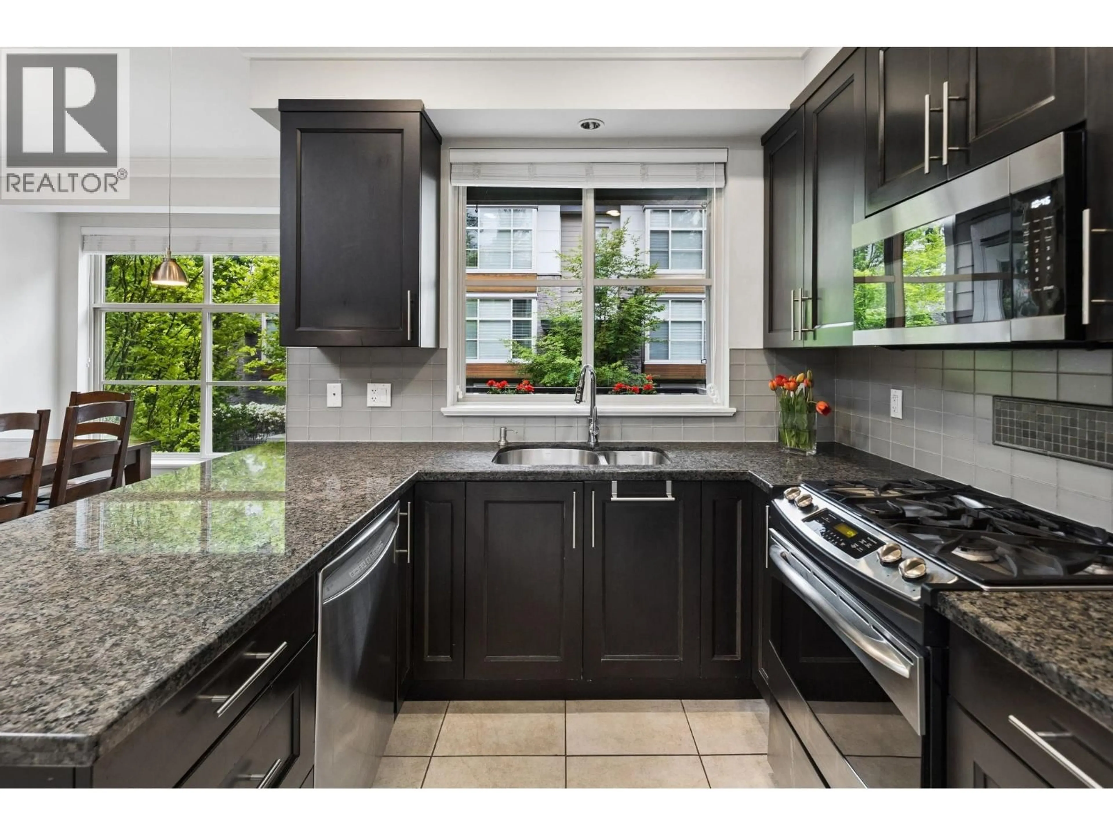 Contemporary kitchen, ceramic/tile floor for 2 - 3025 BAIRD ROAD, North Vancouver British Columbia V7K2G5
